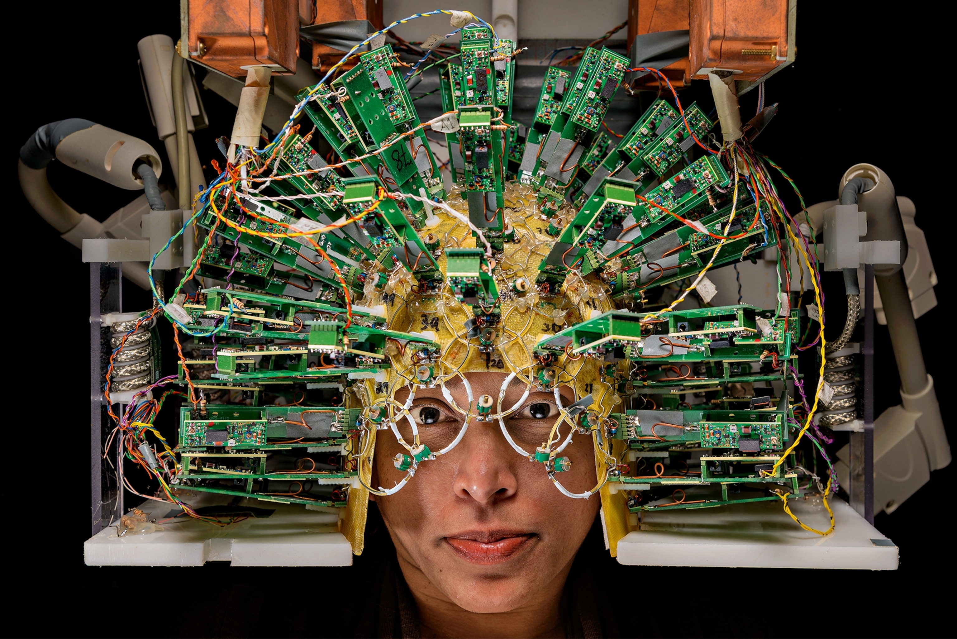 an engineer wearing a helmet of sensors.