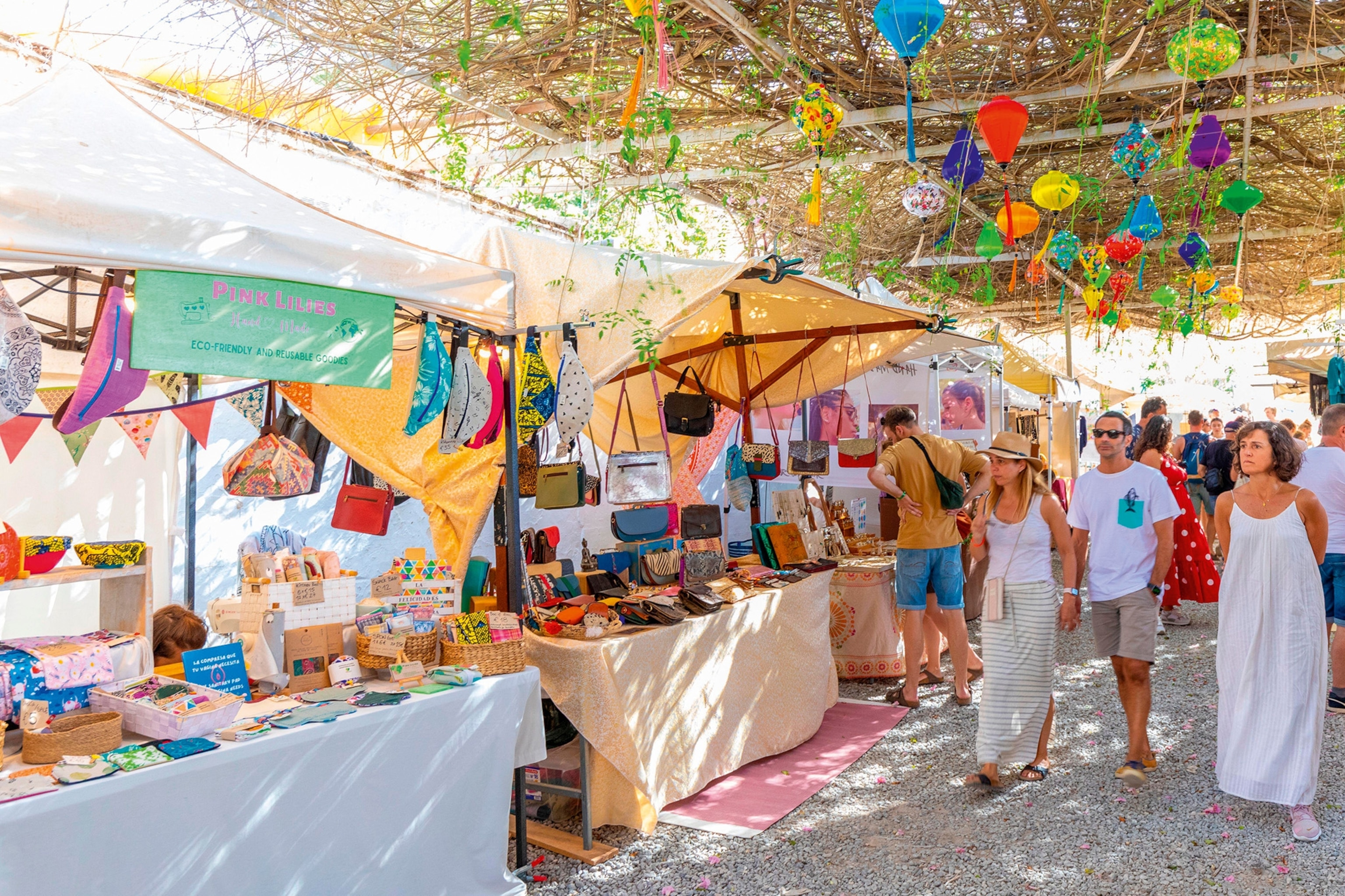 A colourful market selling homemade crafts