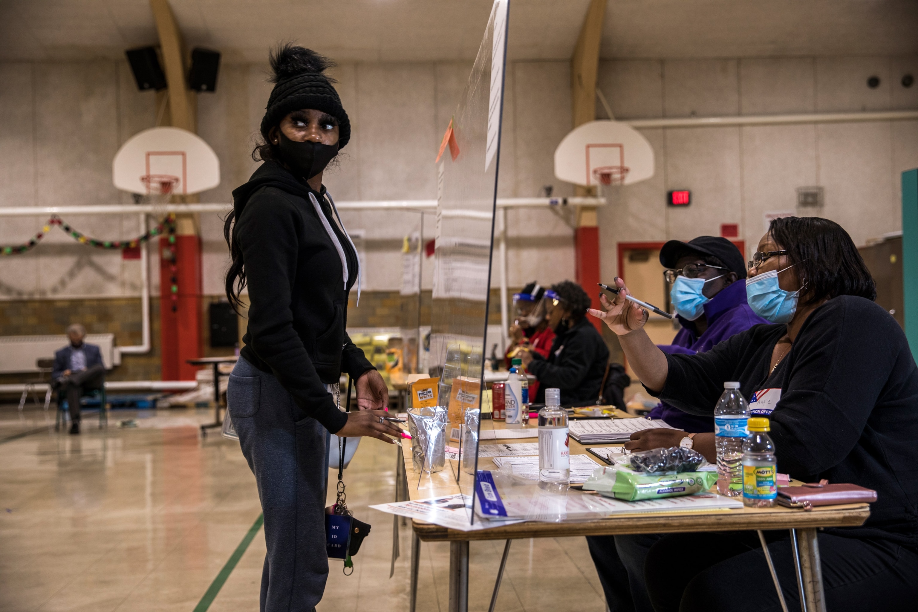 a woman preparing to vote