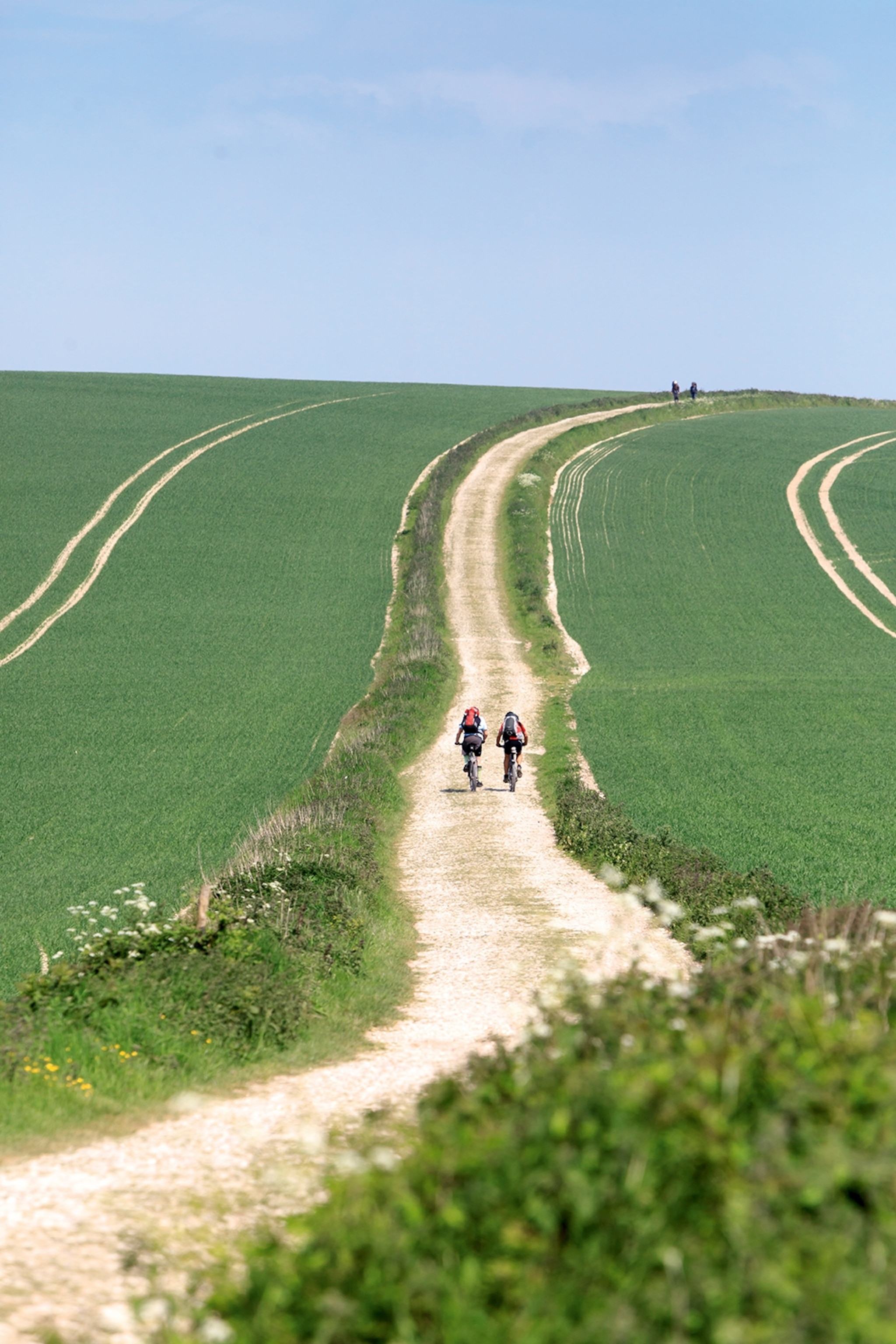 cycling over a hill in england