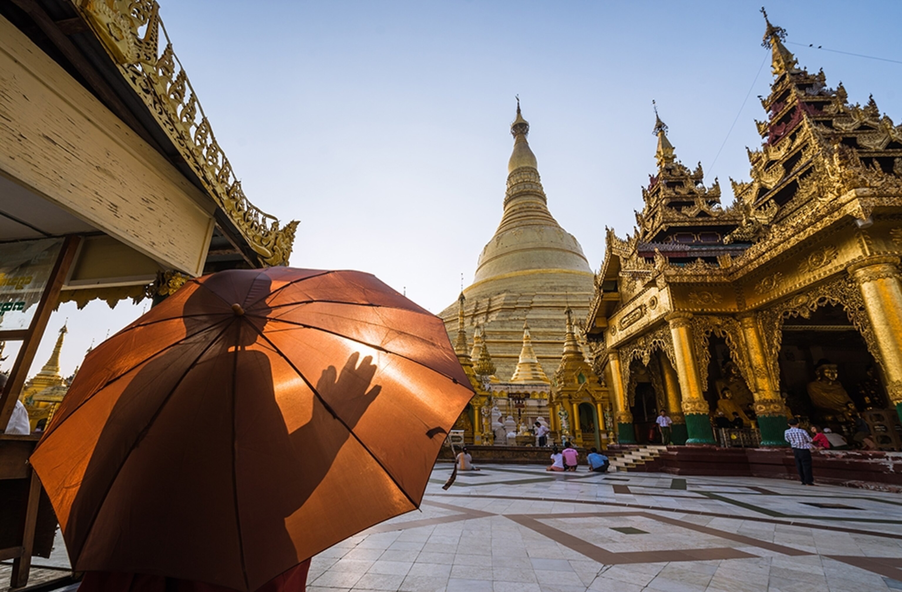 a person gazing at the Shwedagon Pagoda in Yangon, Myanmar