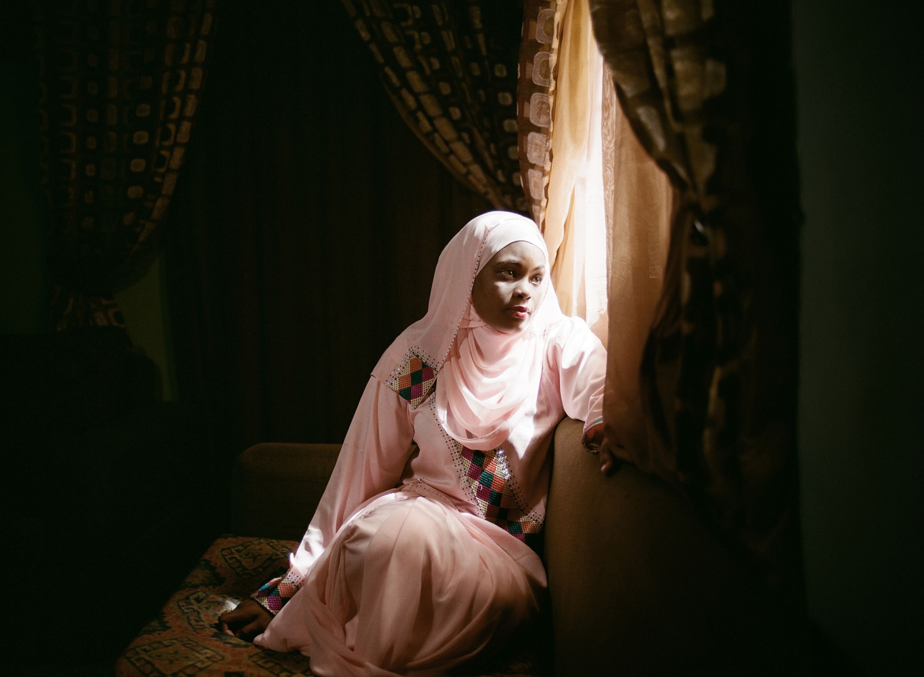 Novelist Farida Ado at her home