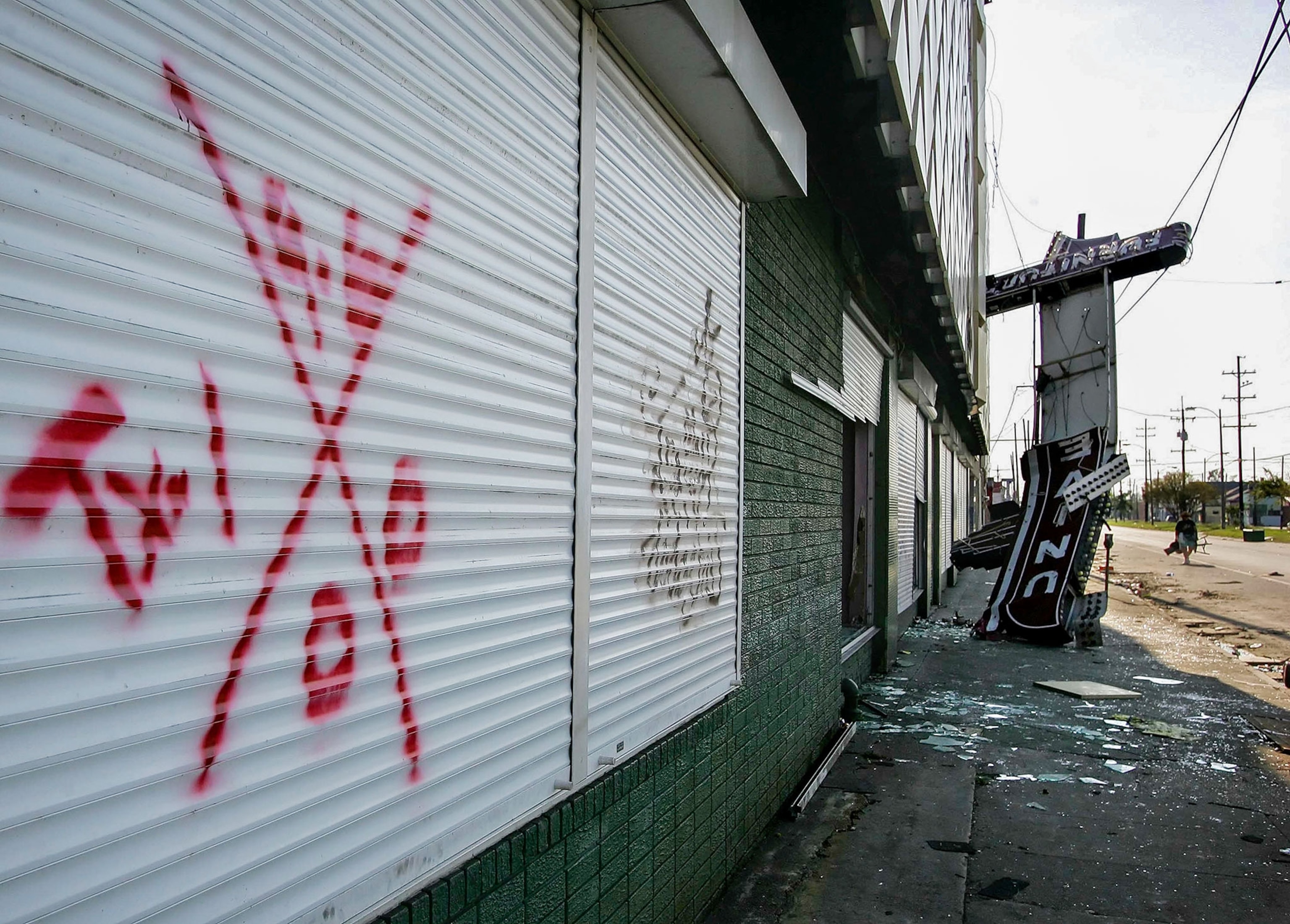an "x" marking a house after Hurricane Katrina
