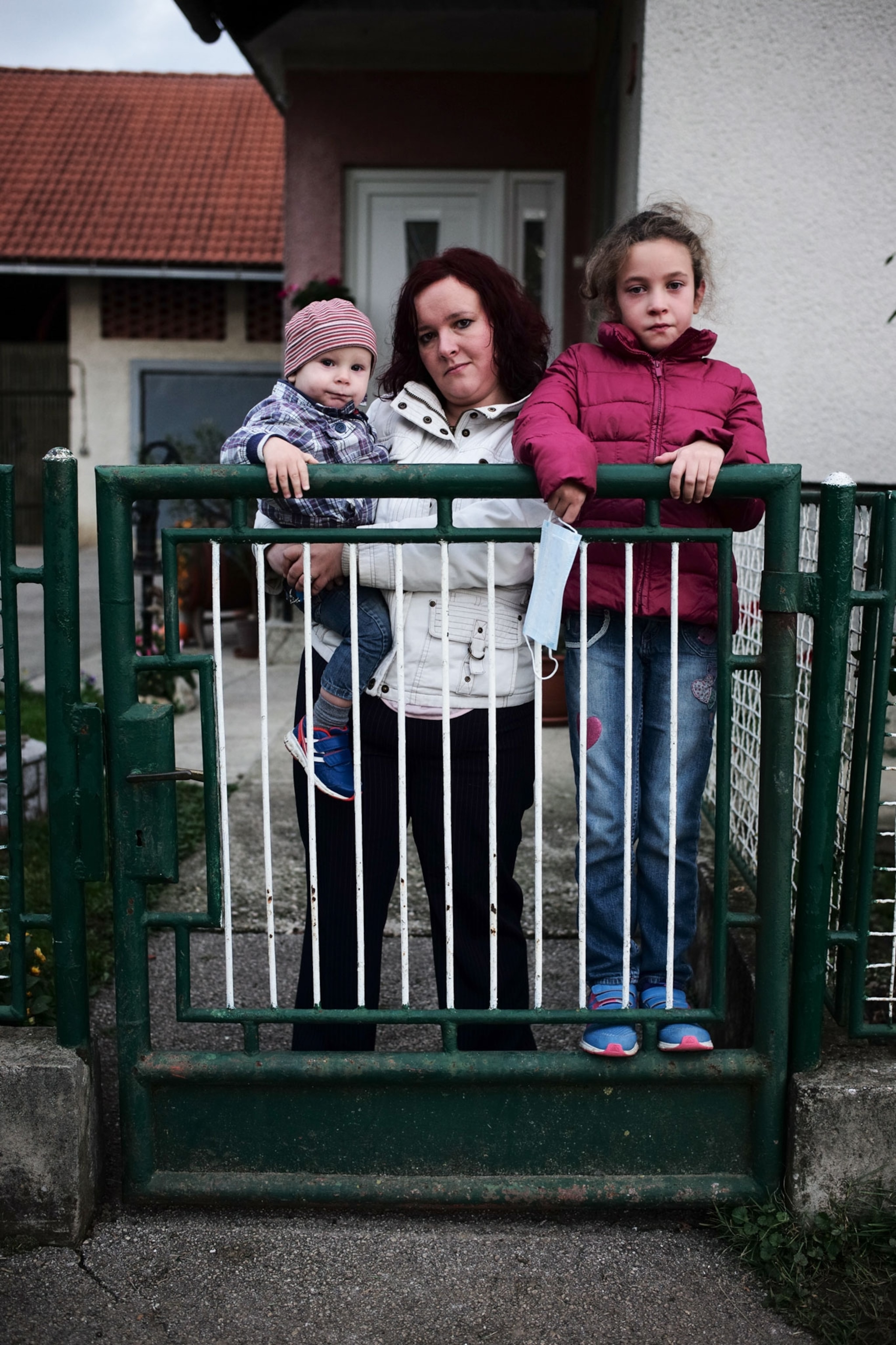 a Slovenian woman and her two children