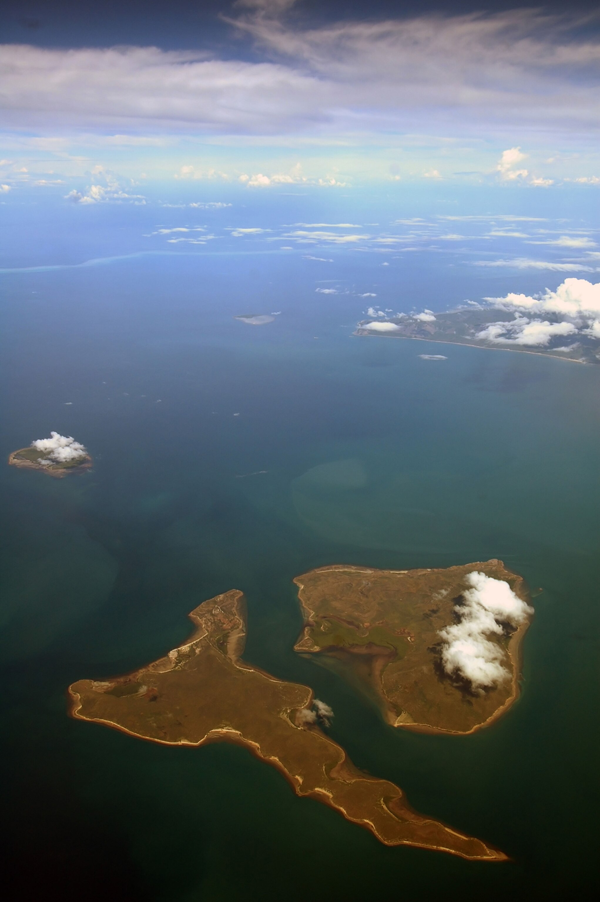 Aerial view of remote Stanley Island (left) and Flinders Island, important Aboriginal sites on the northern Great Barrier Reef