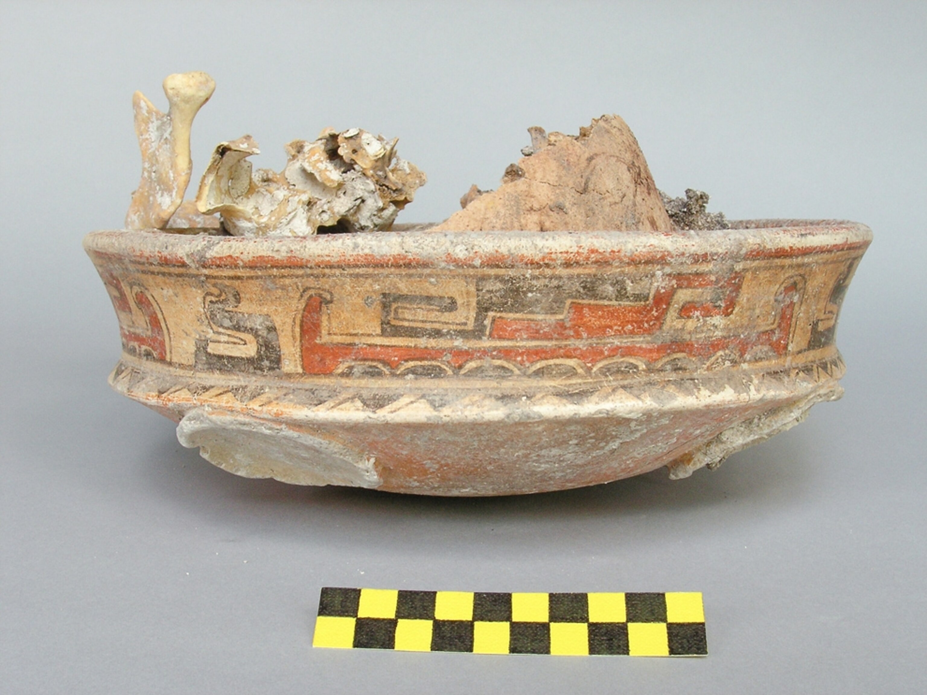 Royal-burial picture: Skull fragments in a bowl