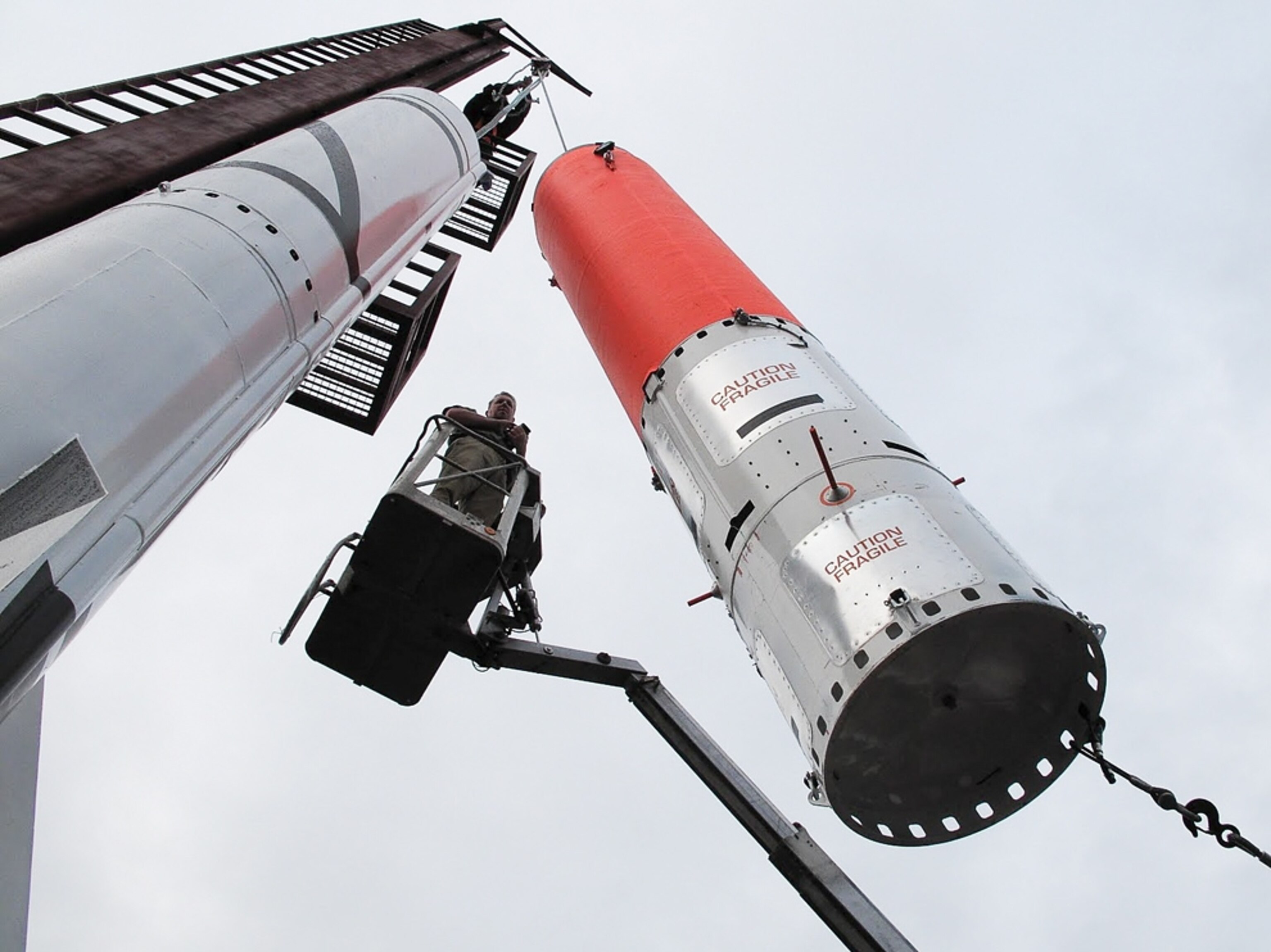 the spacecraft Tycho Brahe being stacked onto the launcher HEAT-IX