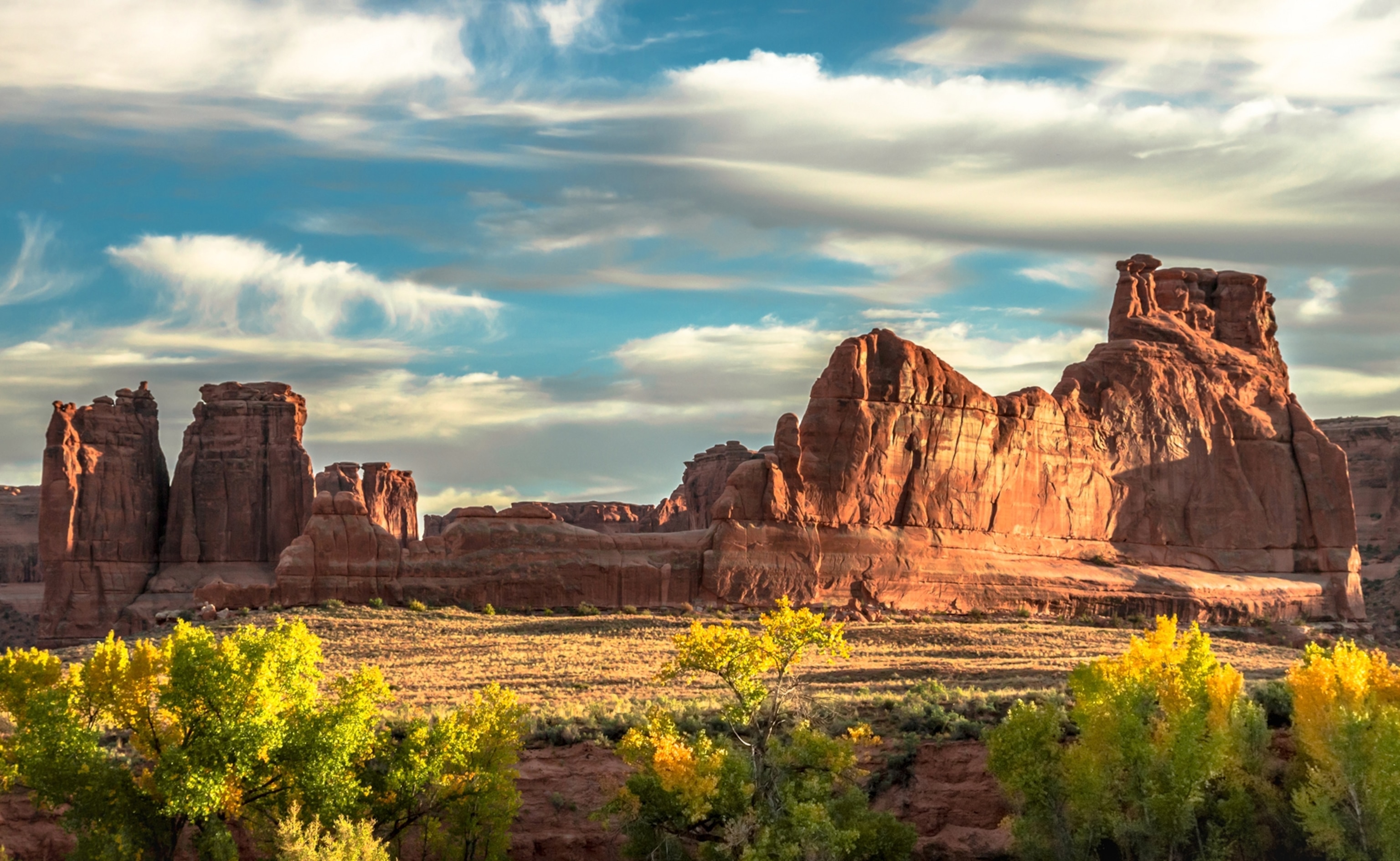 A view of large rocks against a blue sky