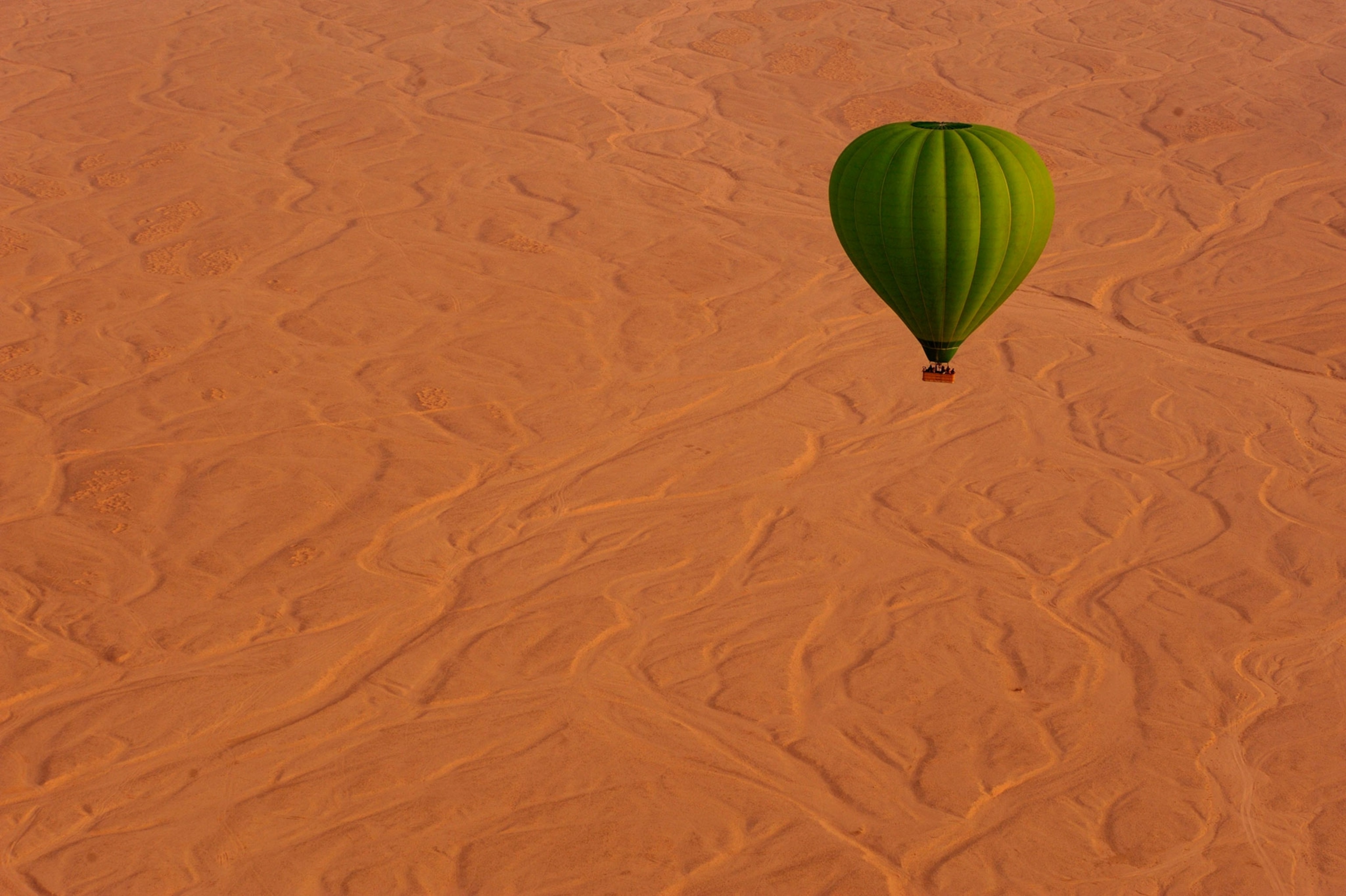hot air balloon above the desert, Theban Mountain