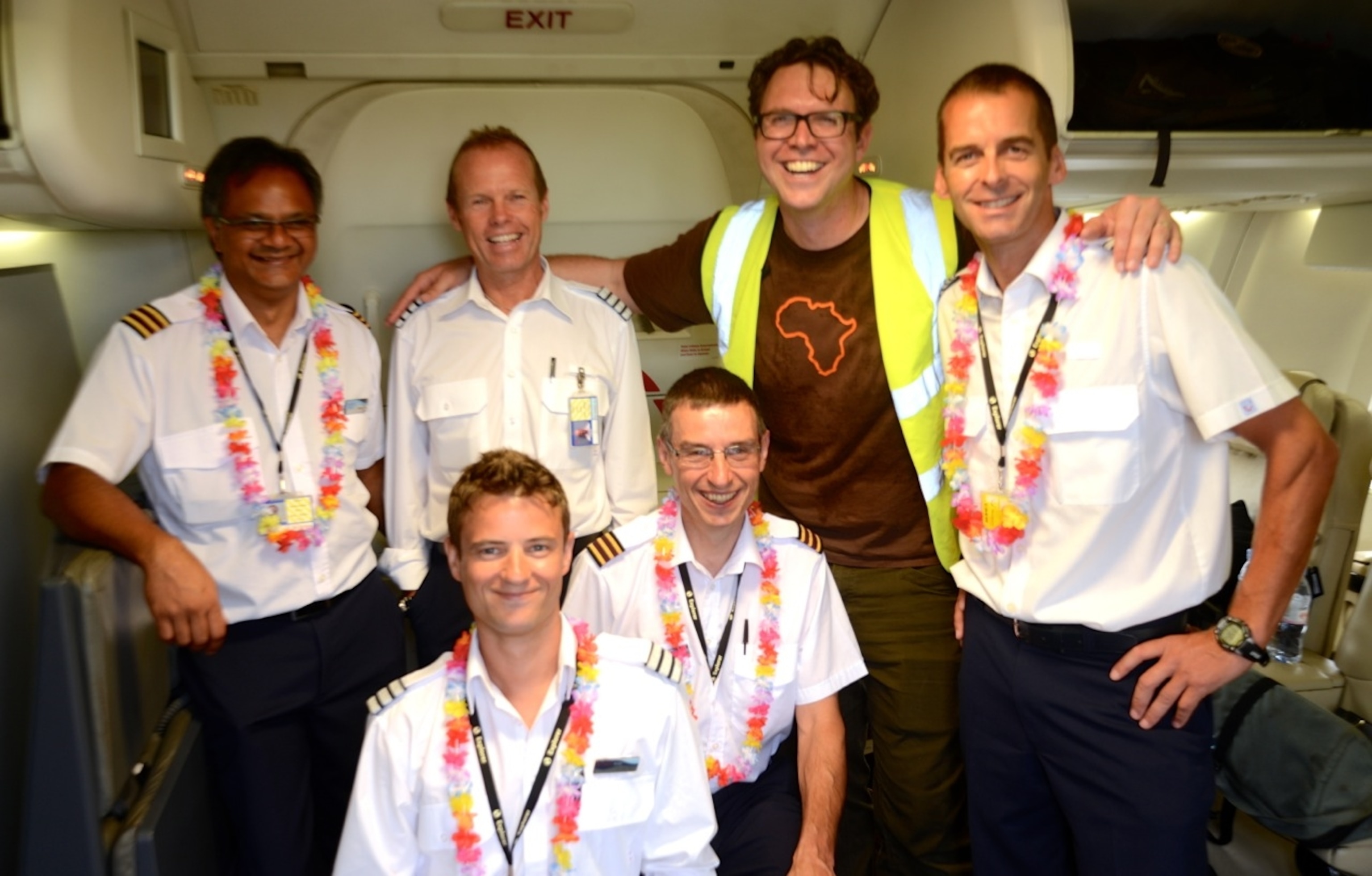 Our amazing flight crew aboard our private jet for National Geographic's 125th Anniversary Expedition (Photo by Josh Newman, National Geographic)
