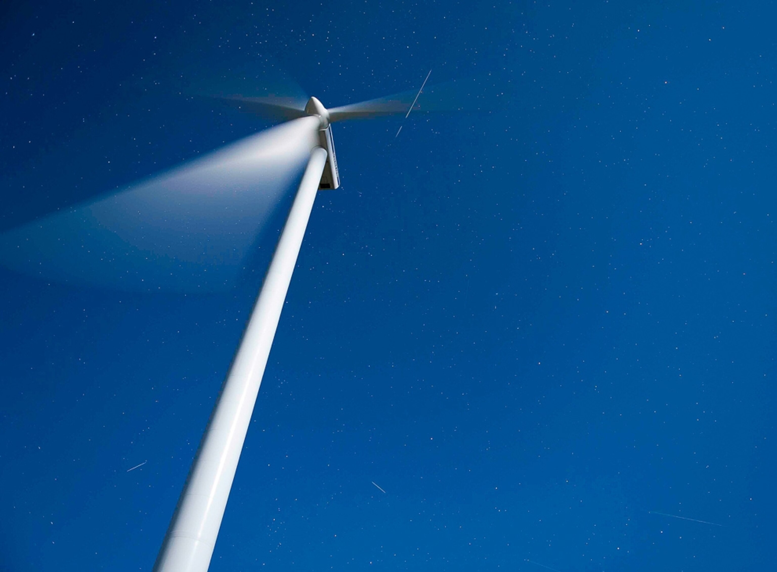 Perseid meteor shower picture: meteor with a wind turbine in the foreground.