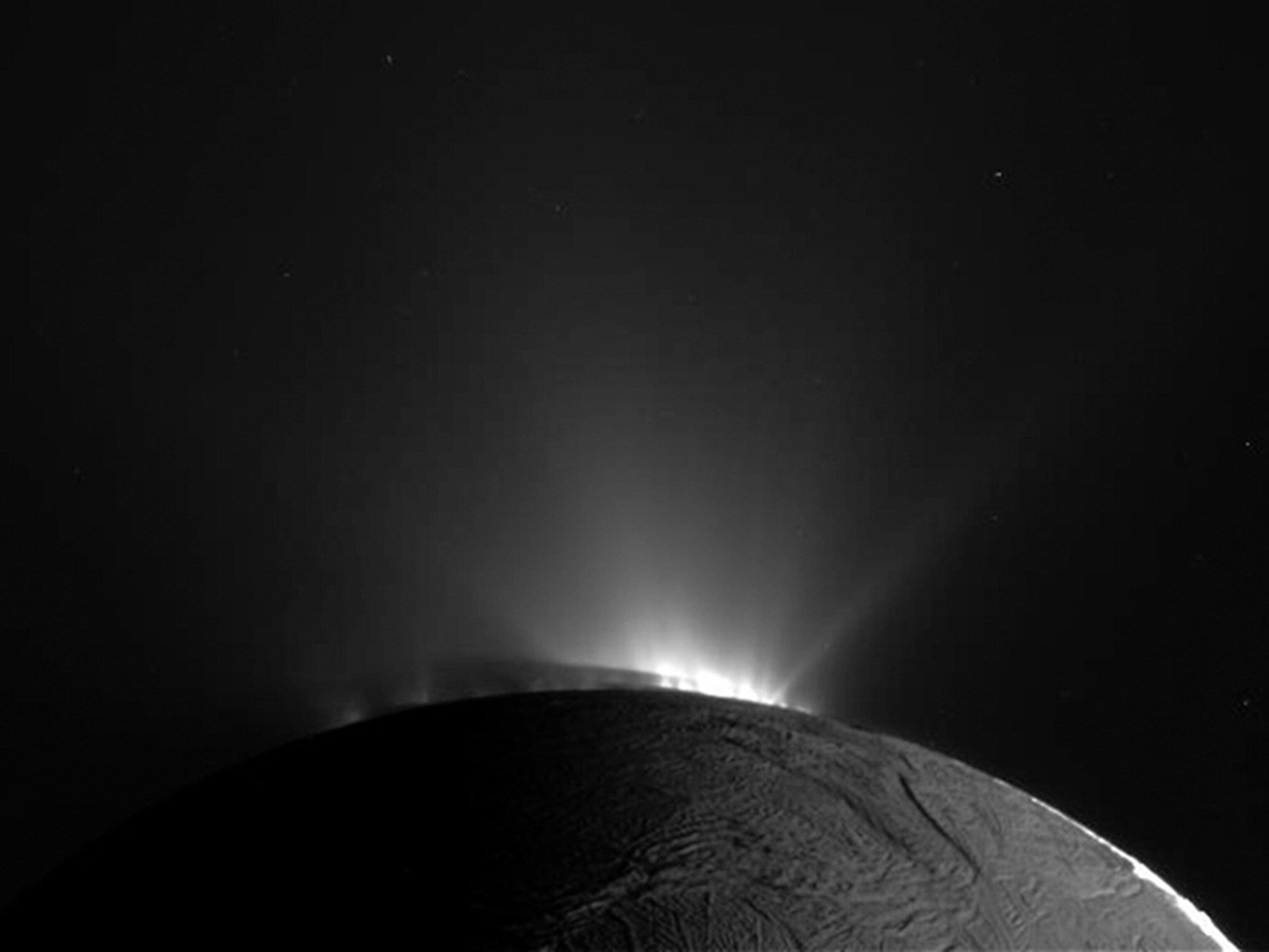 Jets spraying ice from Saturn's moon Enceladus picture.