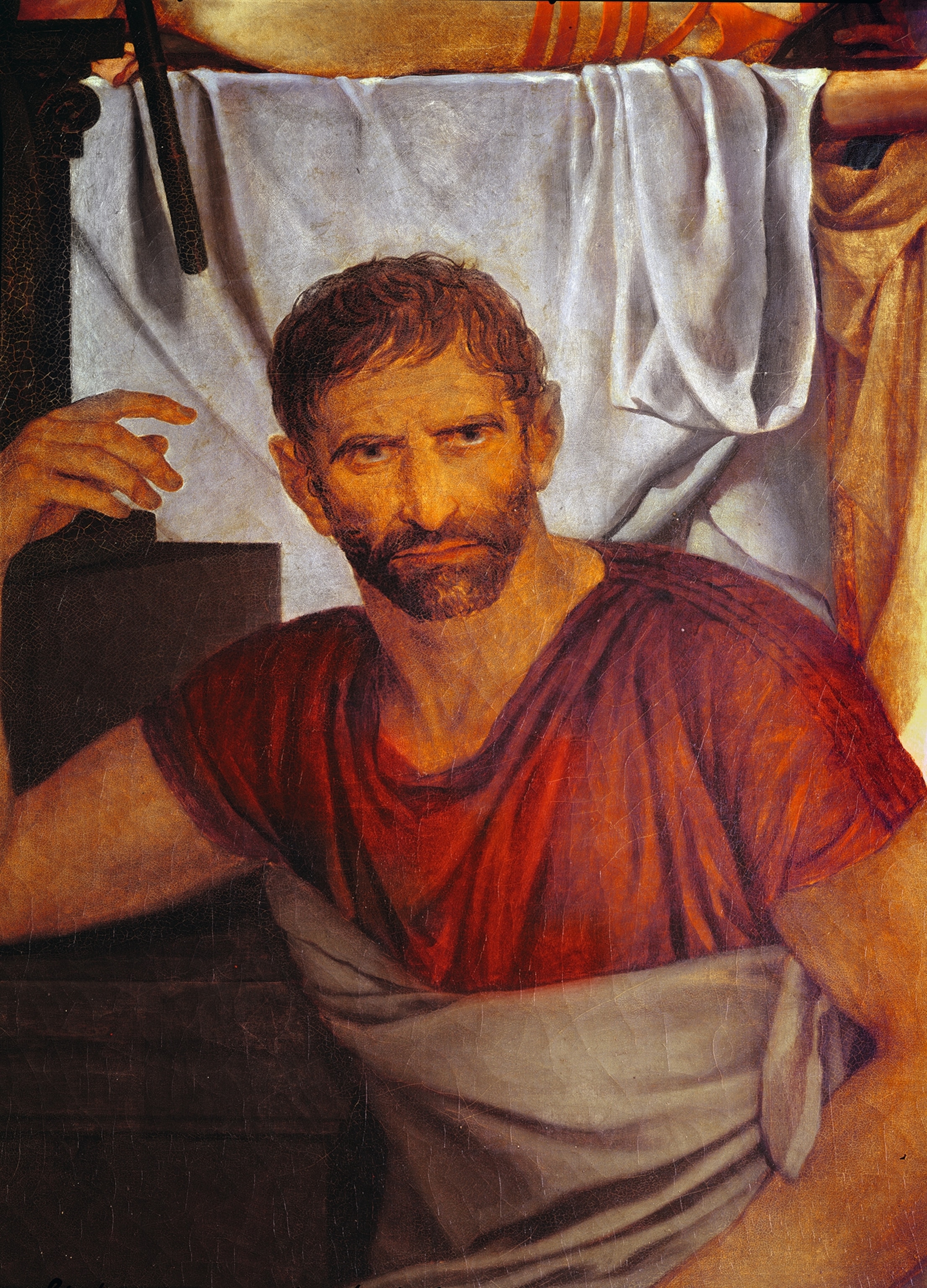 Lucius Junius Brutus is featured in a close-up of Jacques-Louis David’s 1789 oil painting, “The Lictors Bring to Brutus the Bodies of His Sons.”