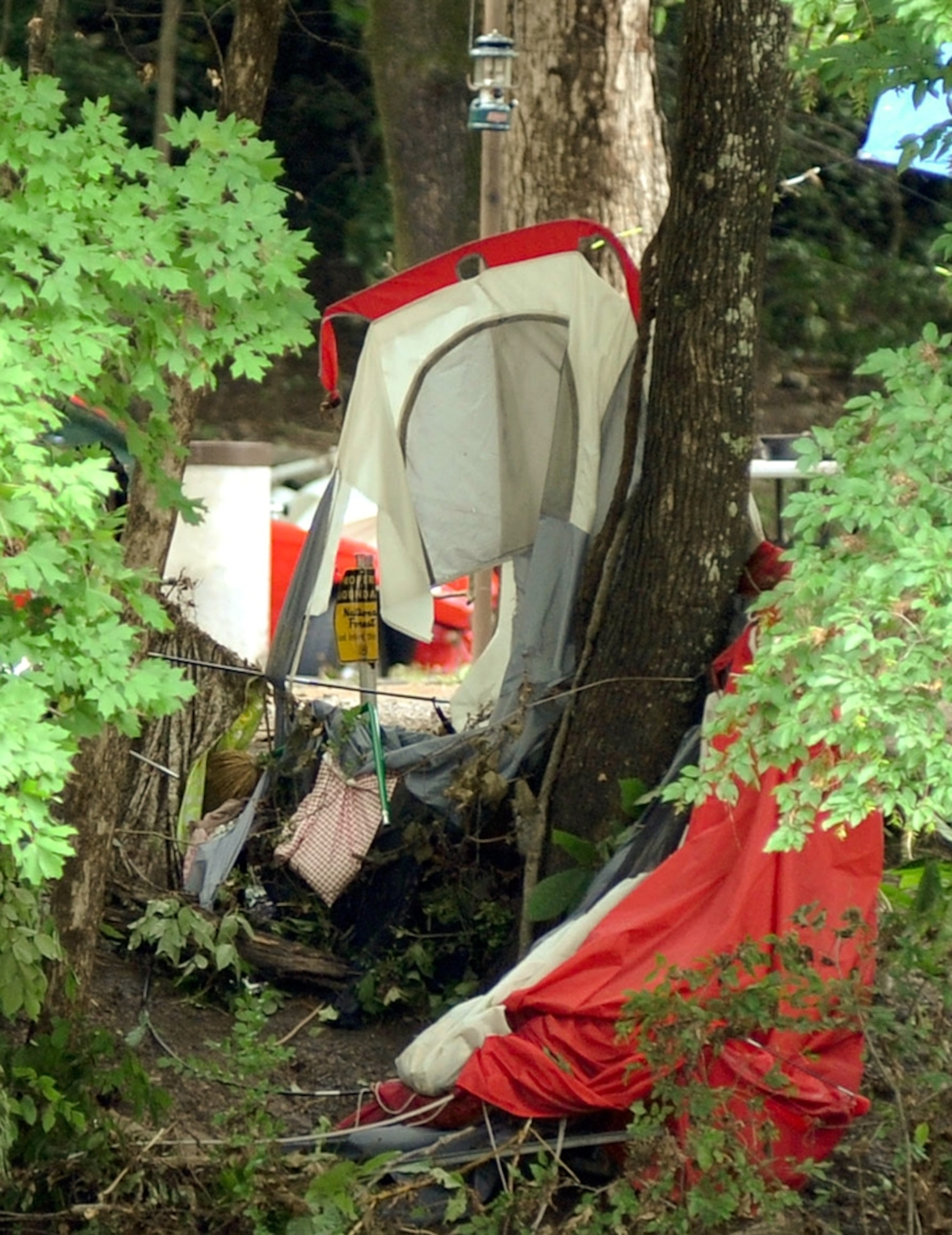 a tent mangled by the Arkansas flash flood