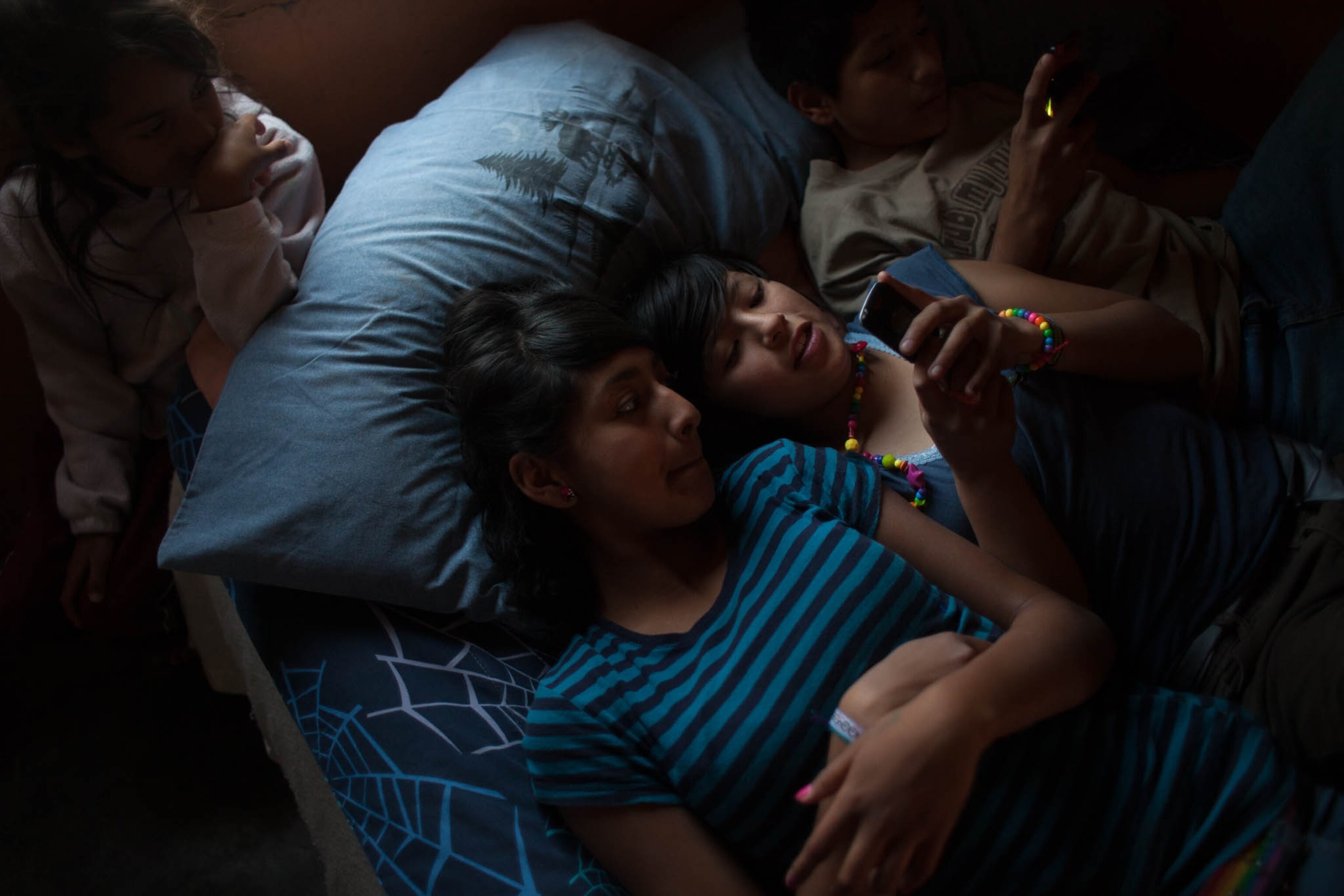 youth relaxing in a bedroom