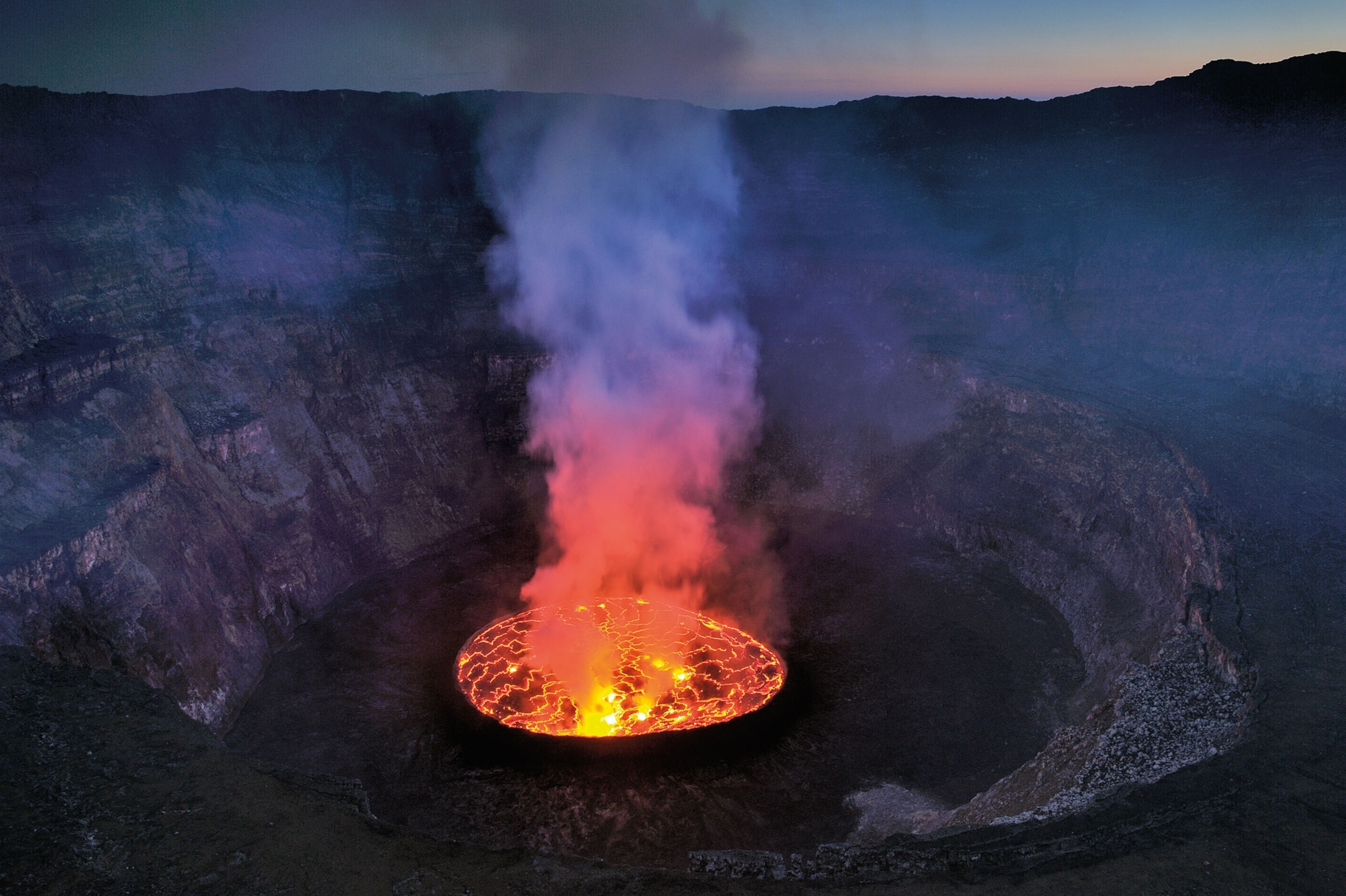 Bubbling lava looking down in a volcano