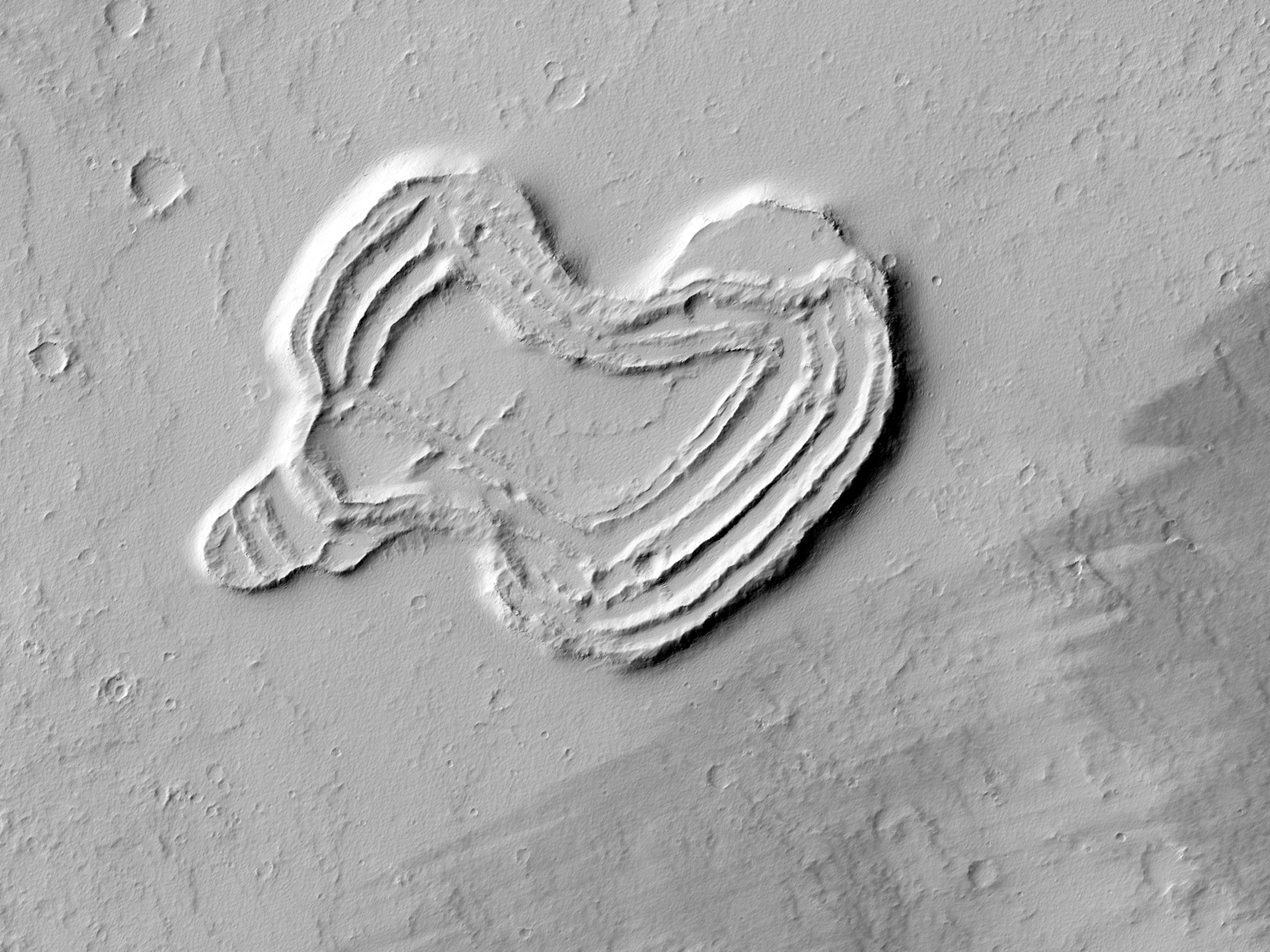 Journalists dressed in special suits are briefed inside the Clean Room at NASA's Jet Propulsion Laboratory in Pasadena, California on the agency's Low Density Supersonic Decelerator (LDSD) project on April 9, 2014. The rocket-powered, flying saucer-shaped test vehicle will soon be sent to Hawaii from where it will be propelled into near-space in June from the US Navy's Pacific Missile Range Facility on the island of Kauai, Hawaii.