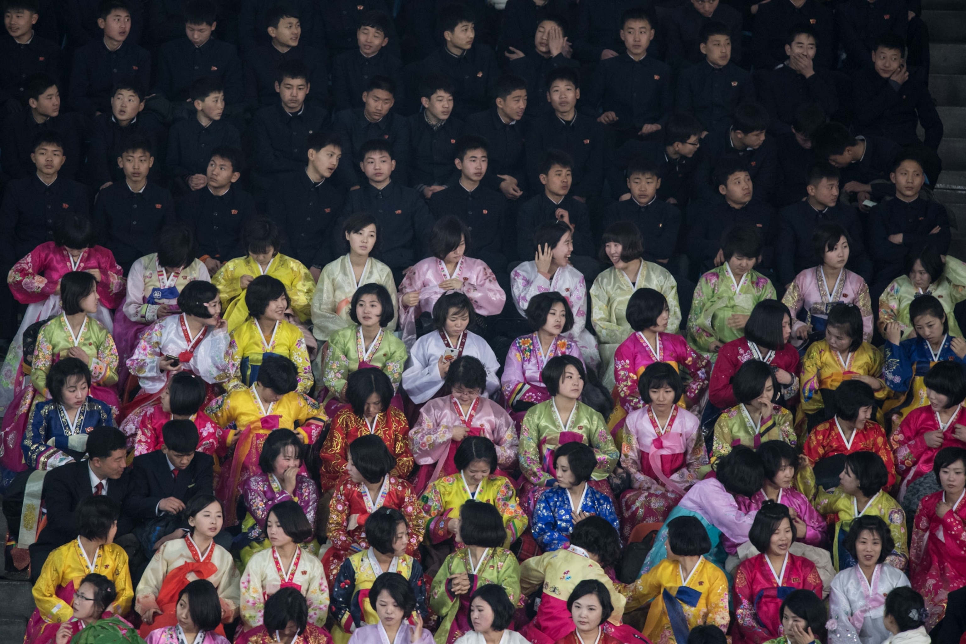 spectators watching ice skating in North Korea