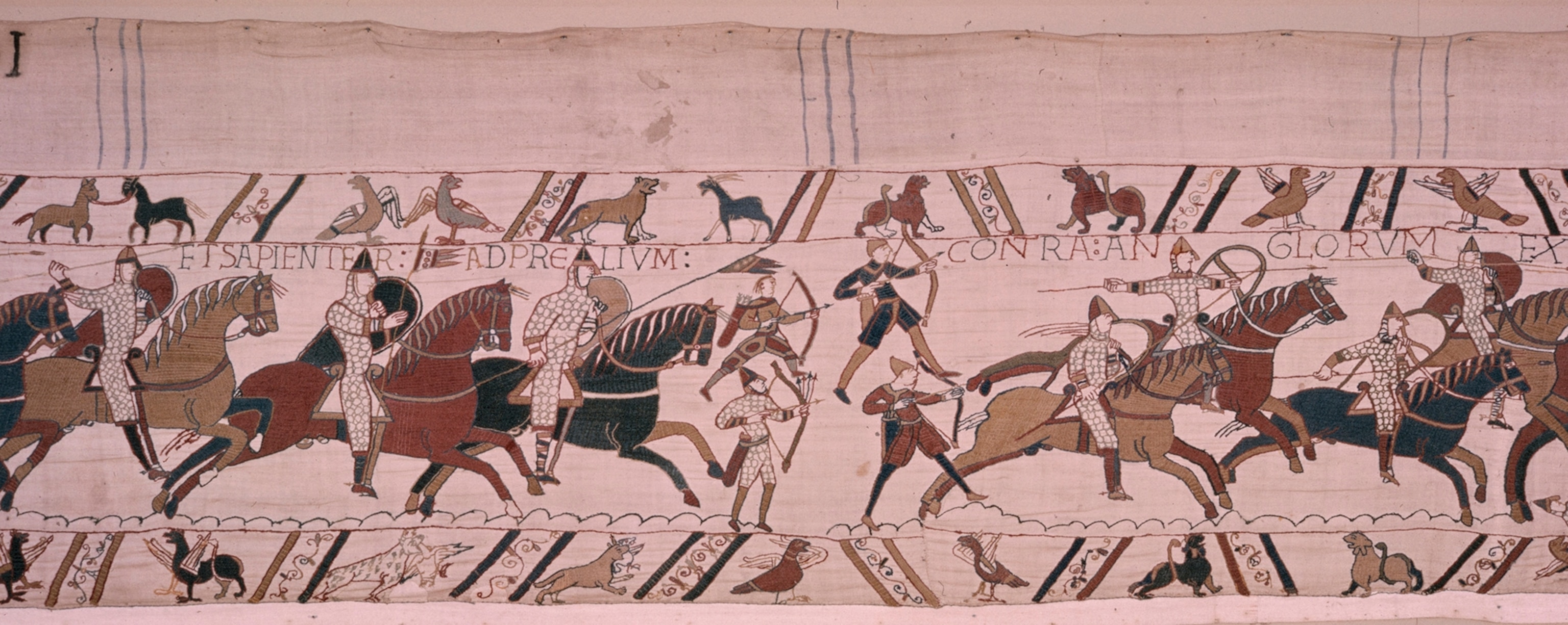 A scene from the tapestry in which William I encourages his army.