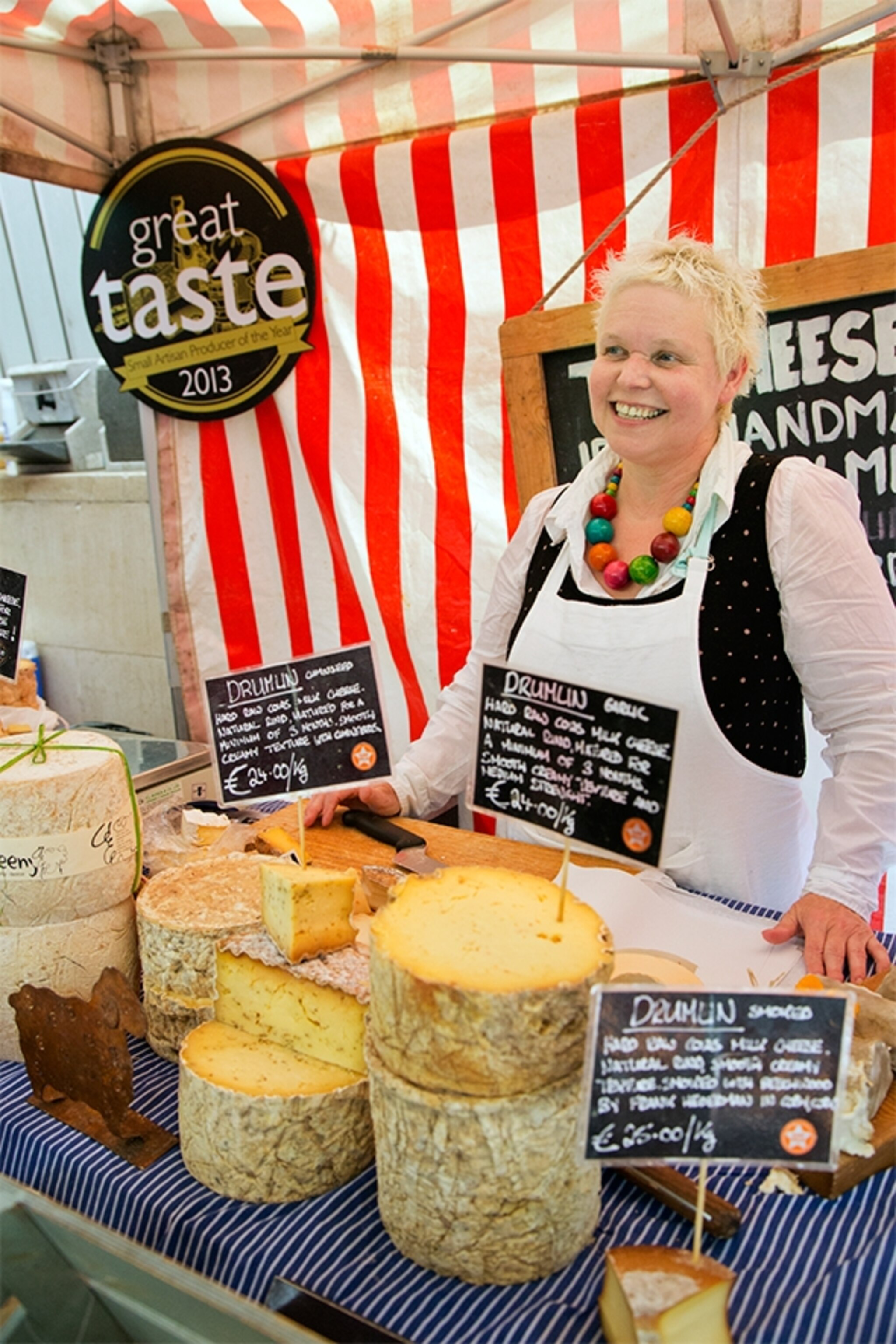 At the Temple Bar Market in central Dublin, Silke Cropp sells her "Creemy" sheep cheese. Cheese has made a huge resurgence in Ireland in the past twenty years. Where there used to be only cheddar, now there are goat, sheep and cow cheeses in abundance. (Photograph by Catherine Karnow)