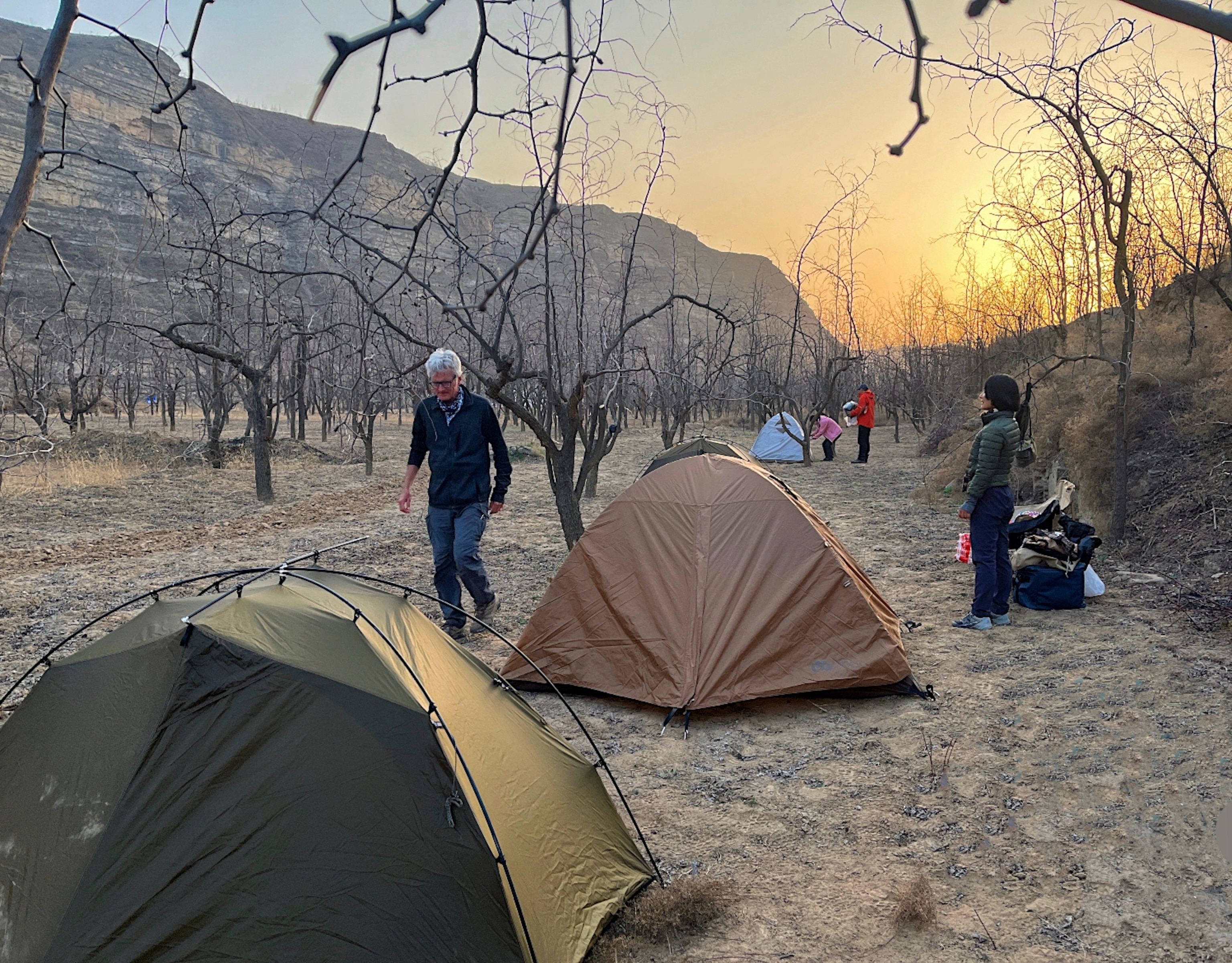 Near Quli Village, in China’s Shaanxi Province, Salopek and his trail companions pitched their tents on the banks of the Yellow River, lined with abandoned shrines, in the winter of 2023.