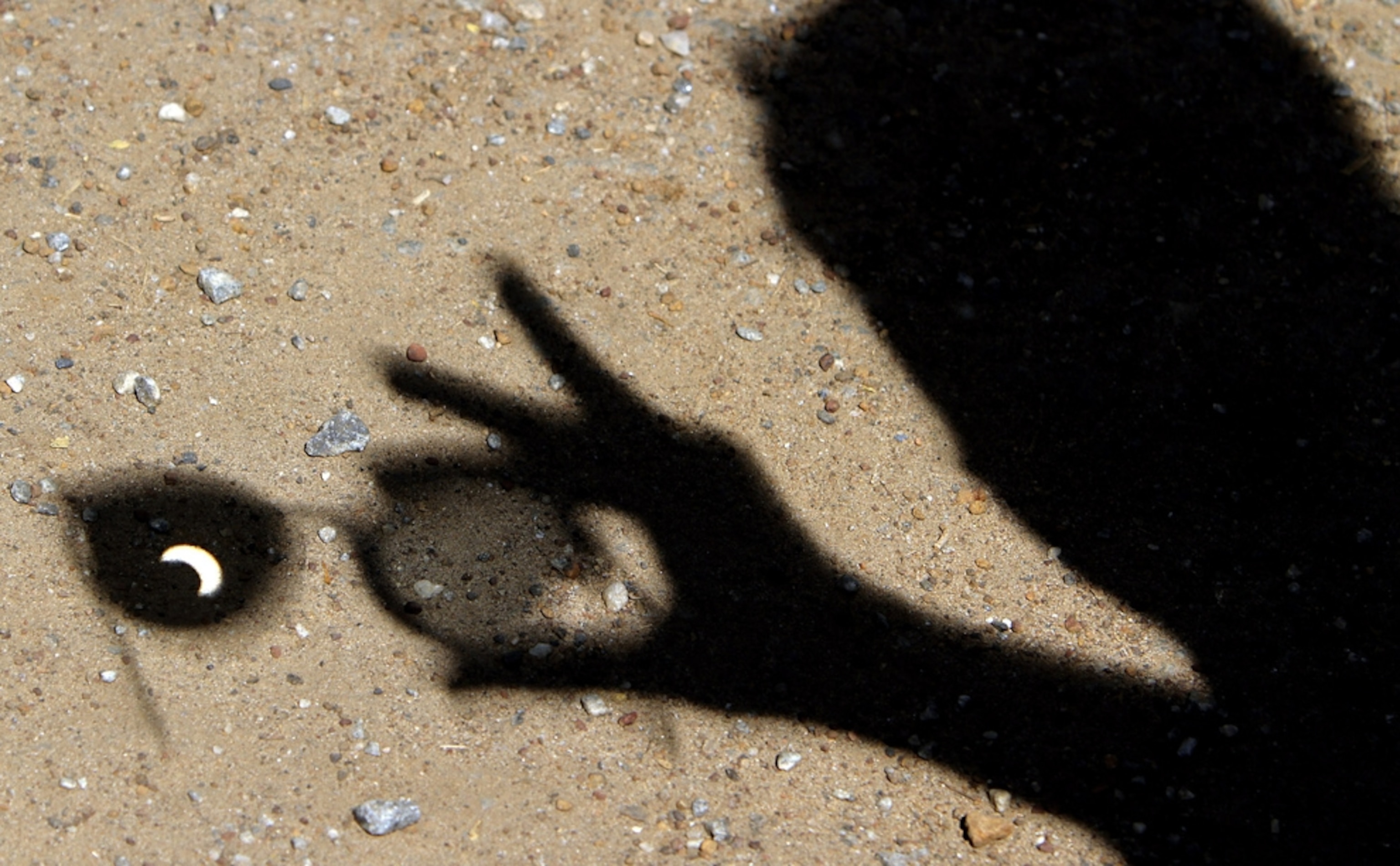 The sun is seen in the shadow from spectacles during an annular solar eclipse in 2010.