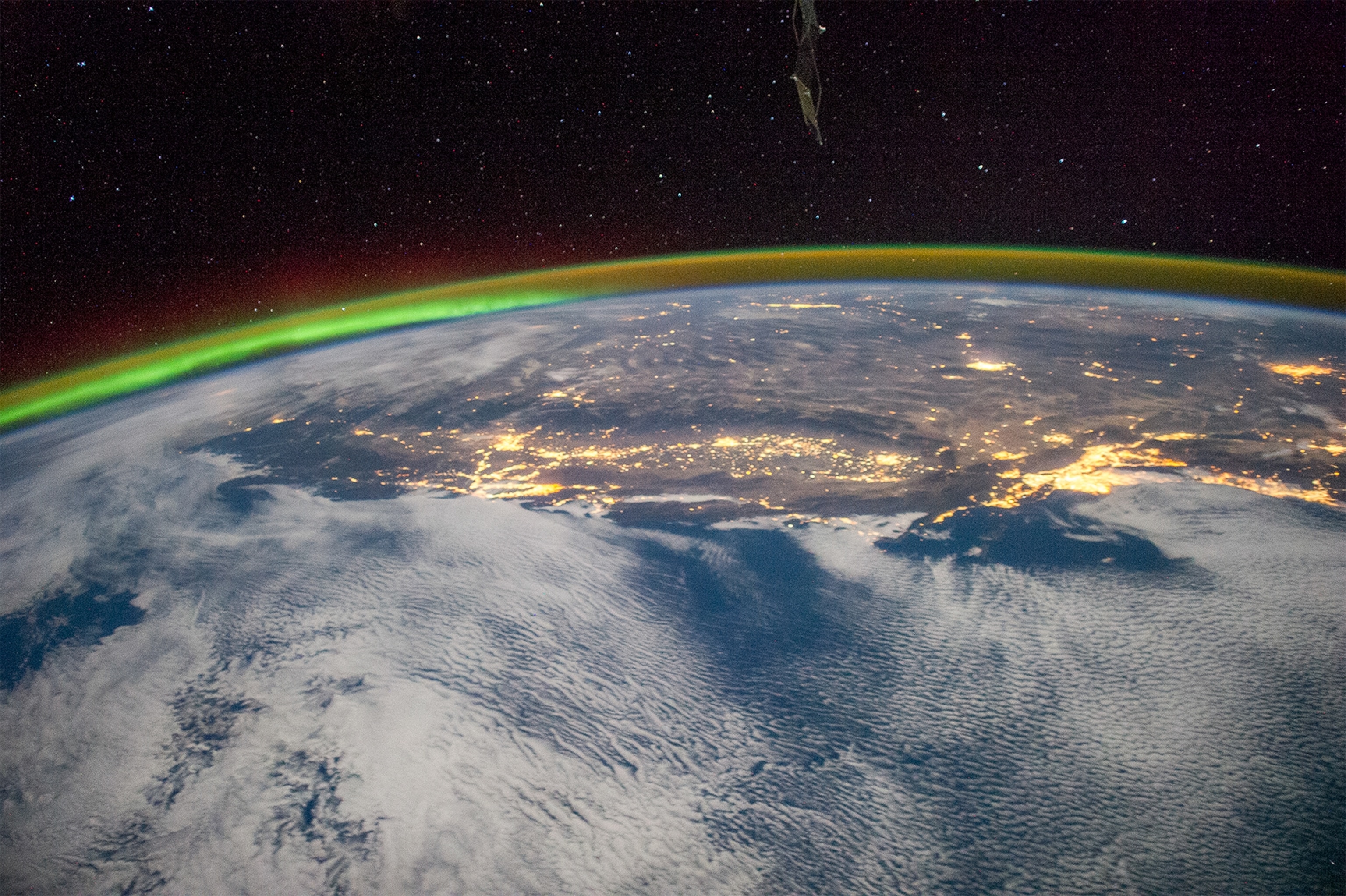 the western United States taken from the International Space Station showing an aurora.
