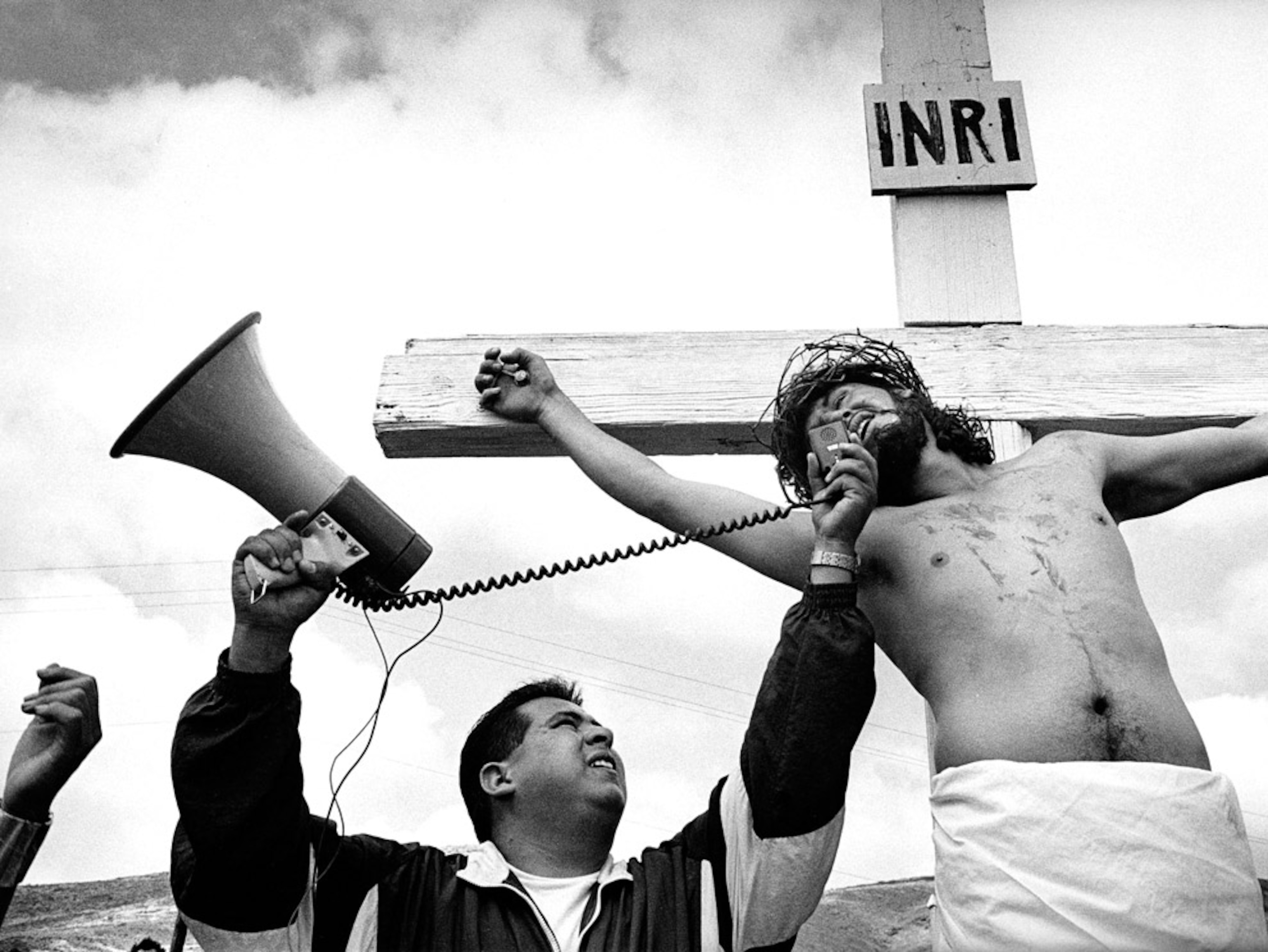 Worshipper on a cross