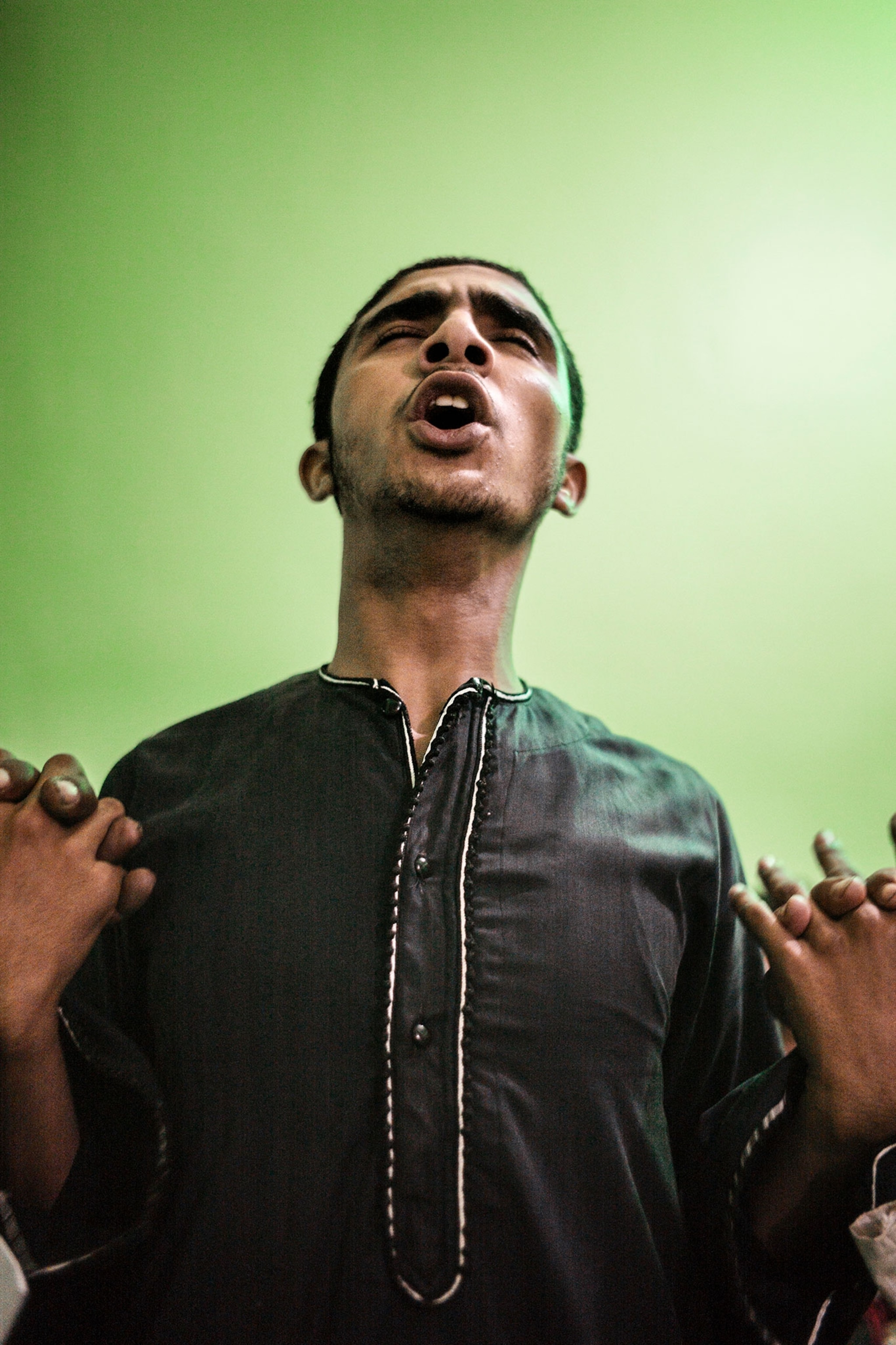 member of the Burhaniya order participates in evening dhikr