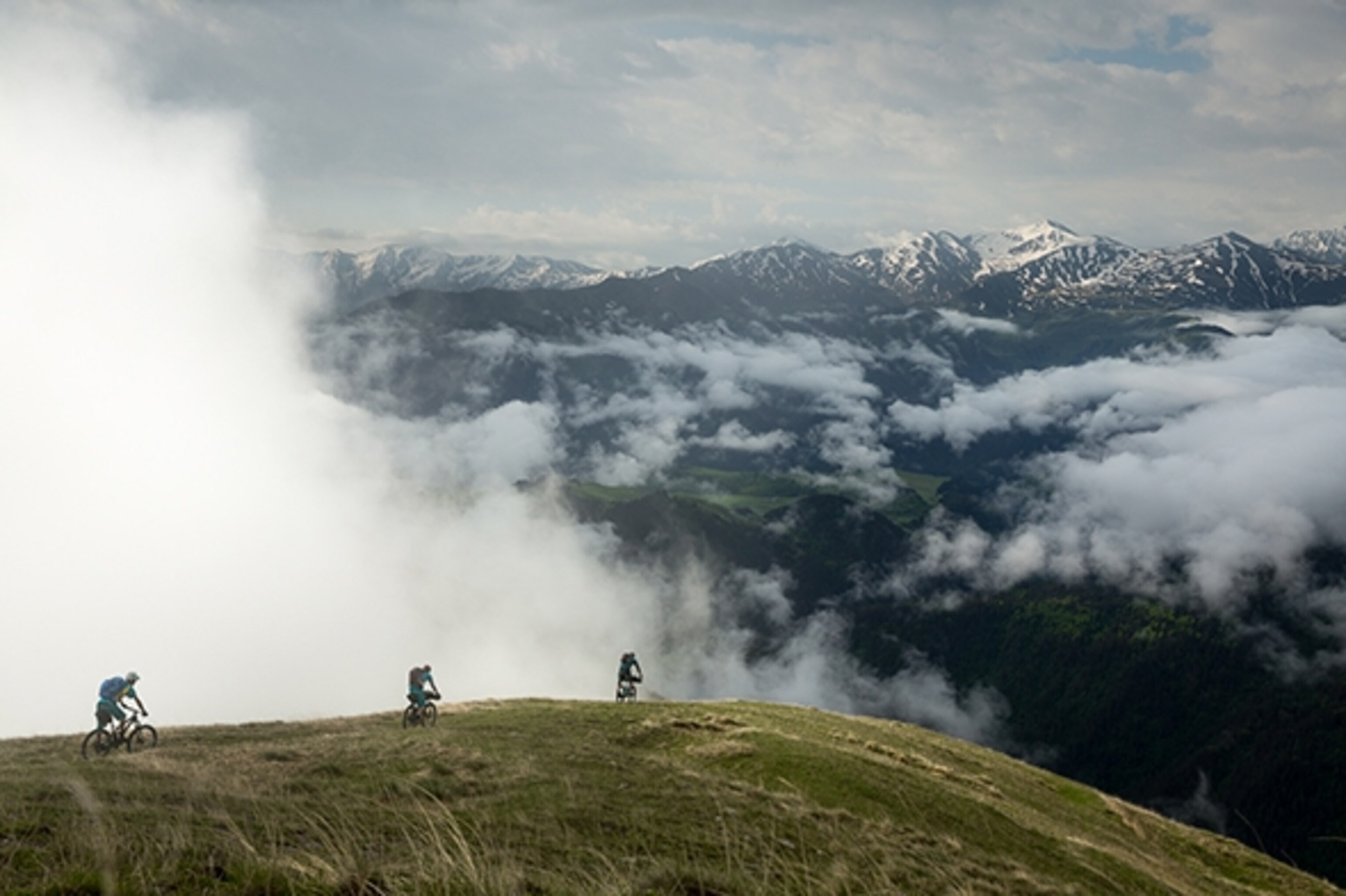Tucked high in the Caucusus Mountains, on the Georgian-Russian boarder, lies some pristine single track and plenty of adventure waiting to be had. Here Sam Seward and Ross Measures make their way down from the base of the glacier on Mt. Kazbek; Photograph by Joey Schusler