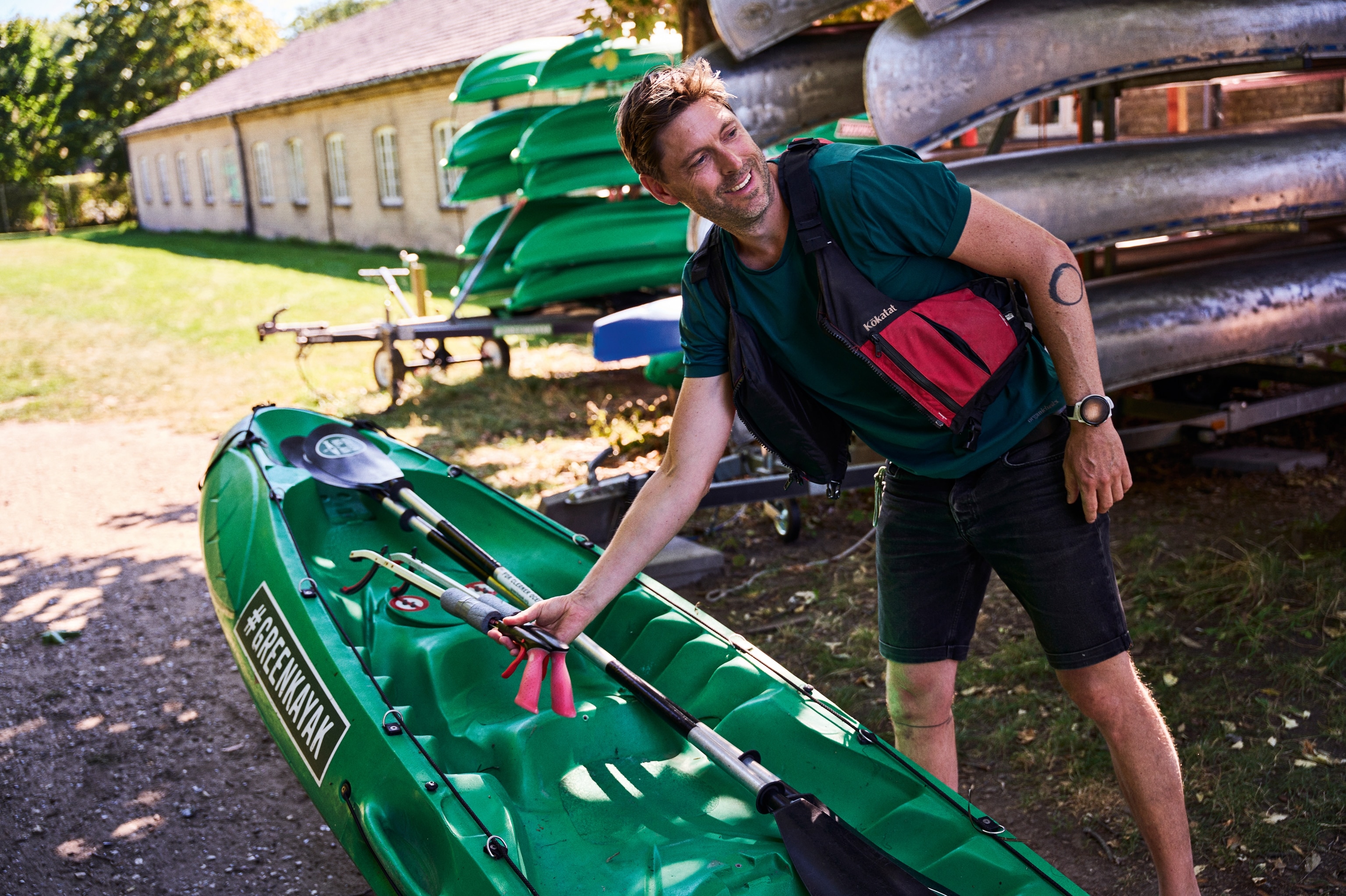 Man holding kayak