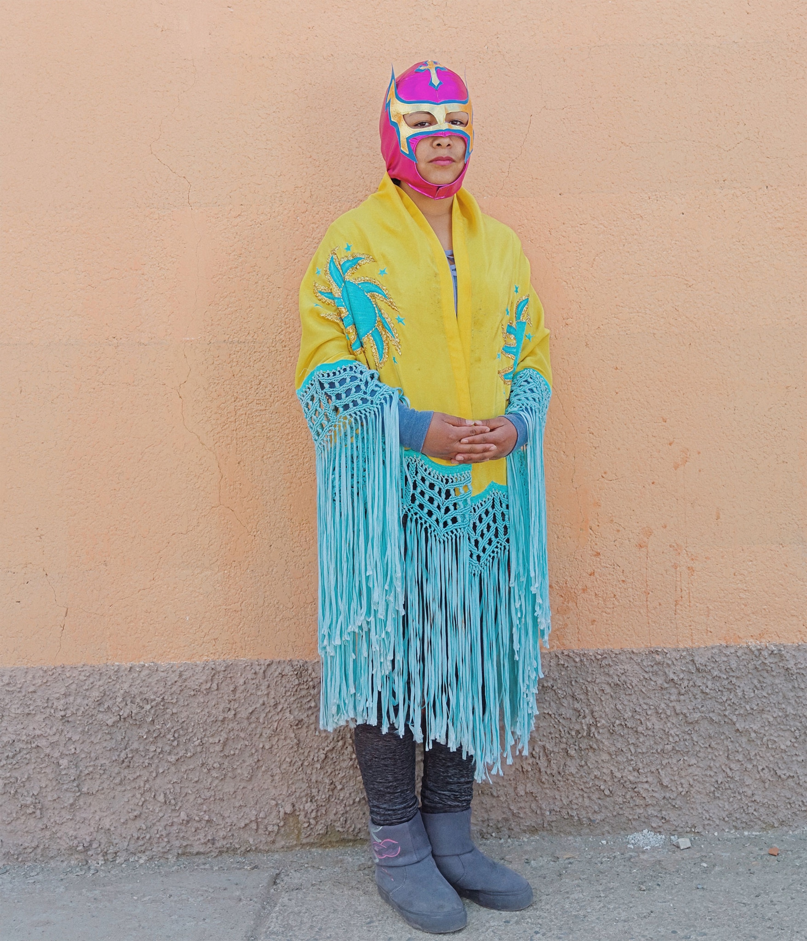 an indigenous woman wearing a mask in Bolivia