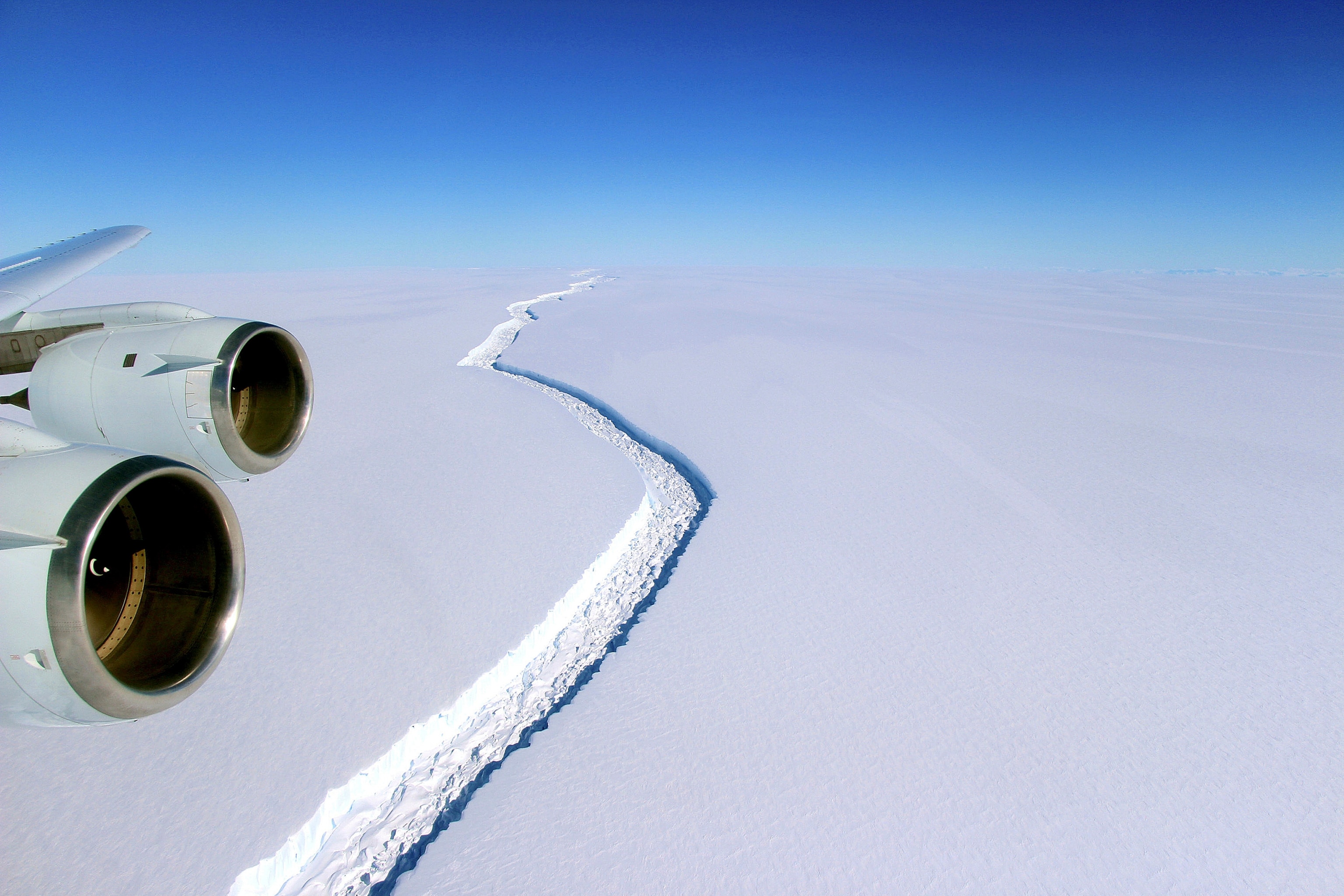 an aerial view of a fissure in the Larsen C ice shelf in Antarctica