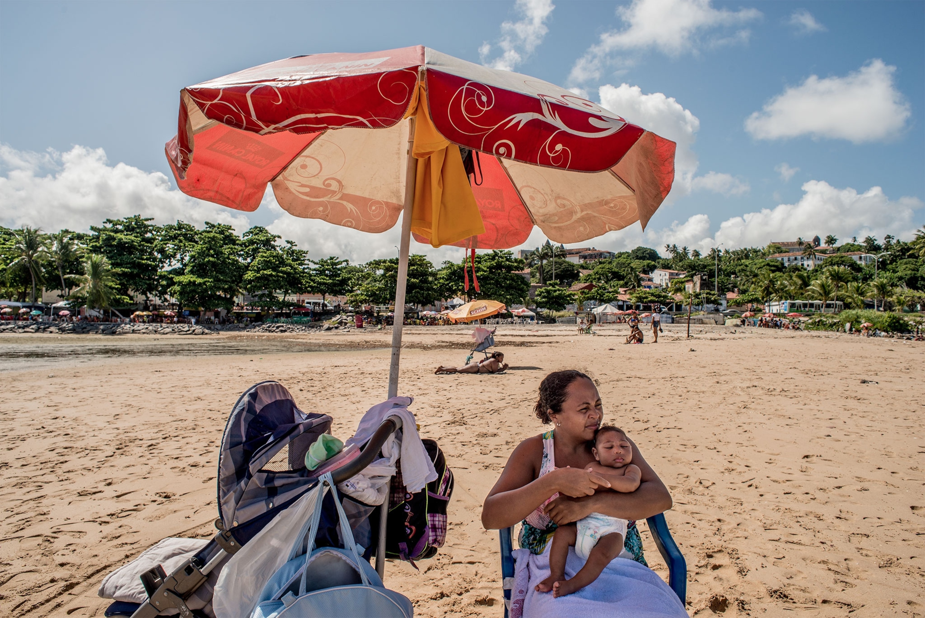 mother and baby on beach