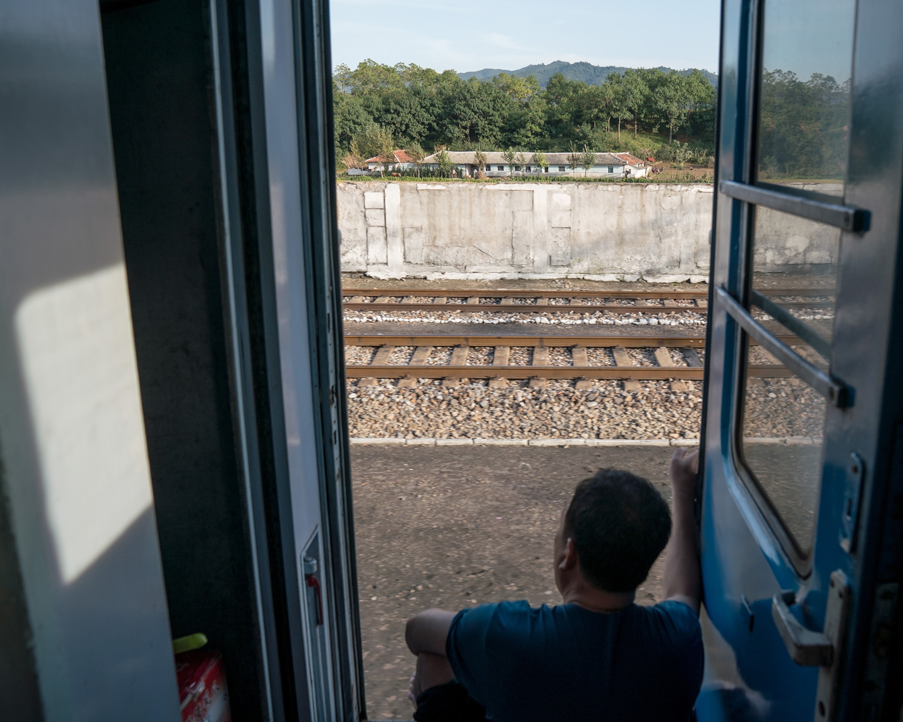 a man on a train in North Korea