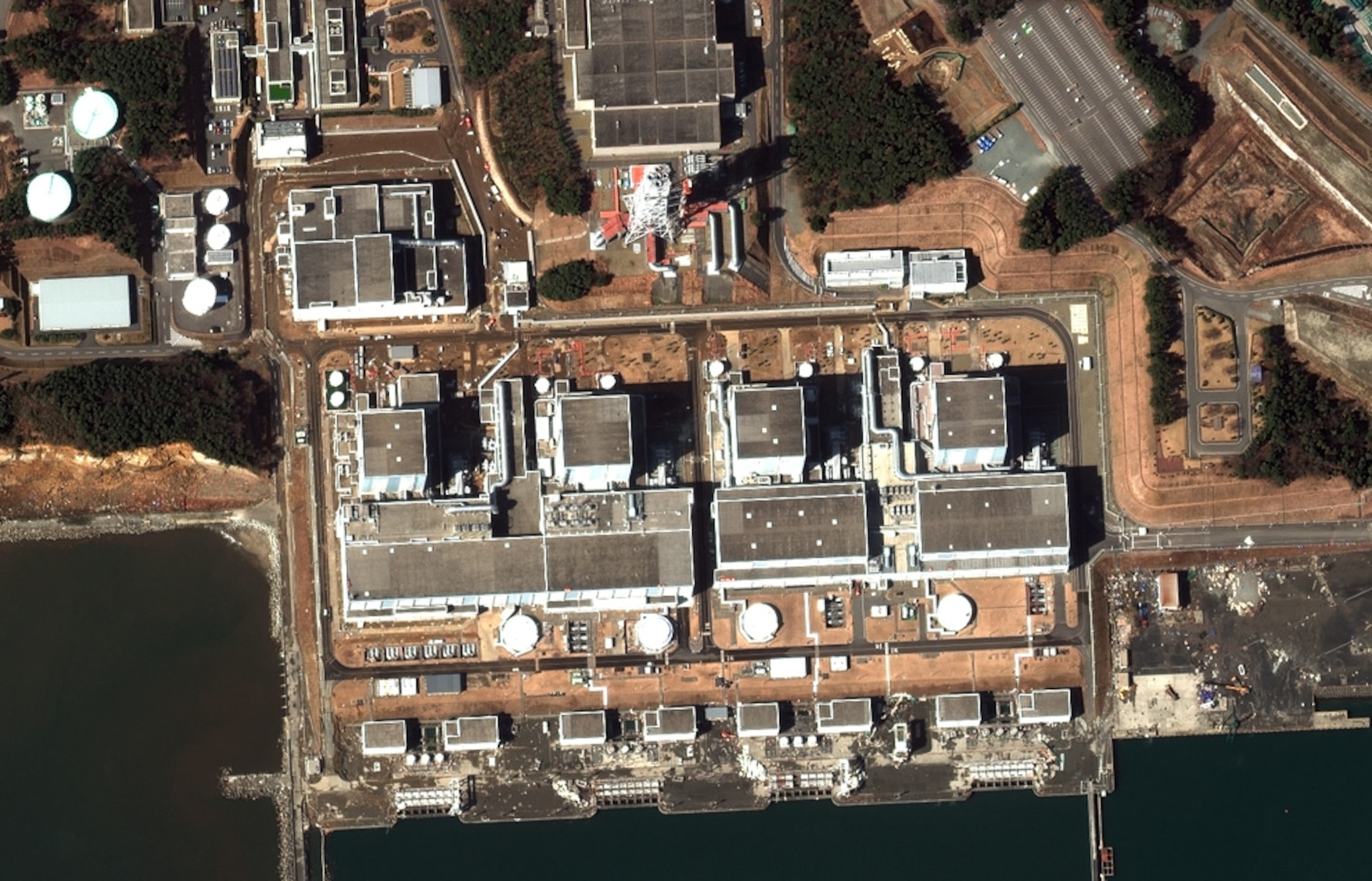 Fukushima Daiichi nuclear power plant, Japan, picture: satellite image of reactor buildings before explosions in wake of earthquake and tsunami