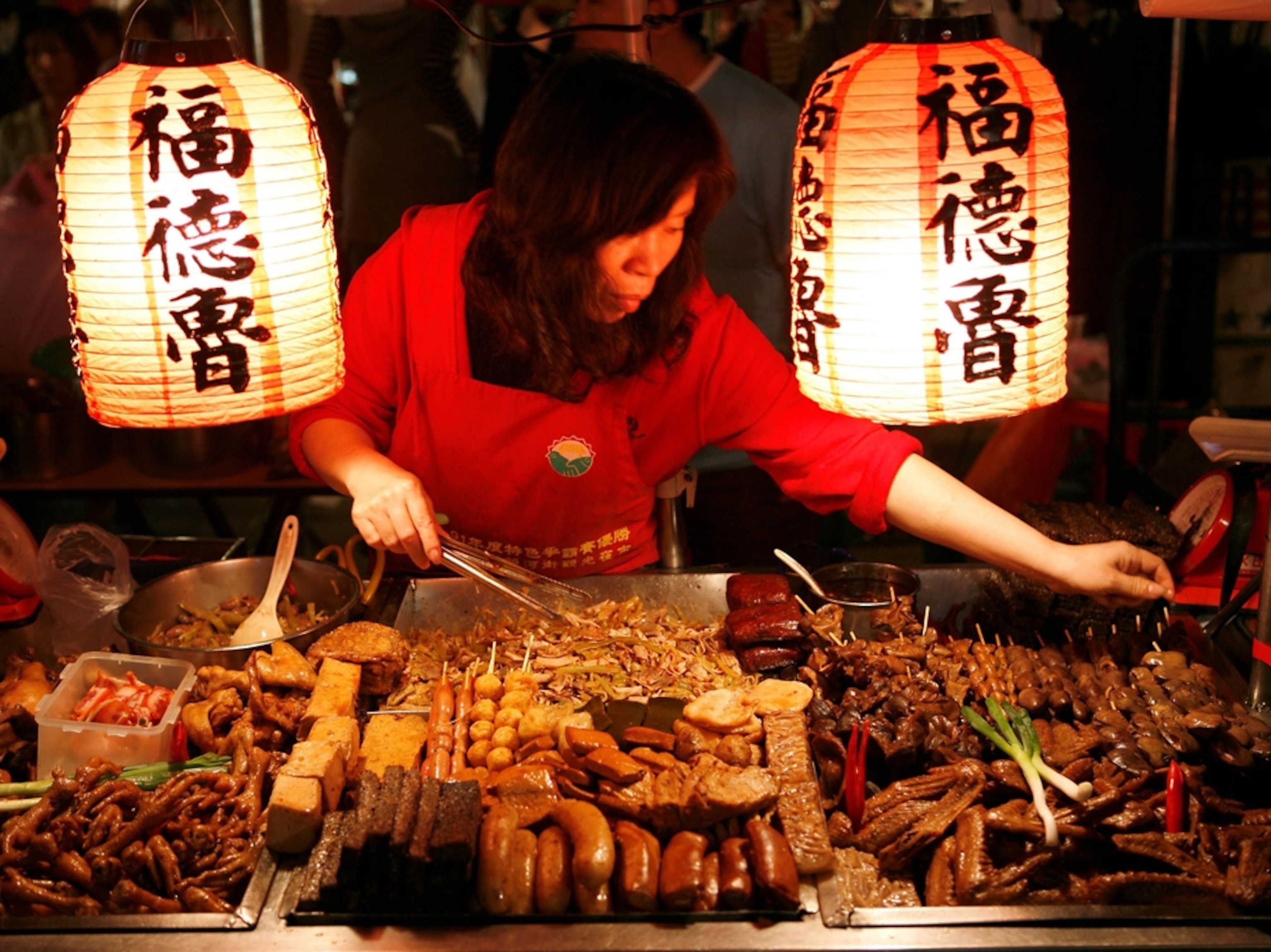 a vendor at the Shilin night market