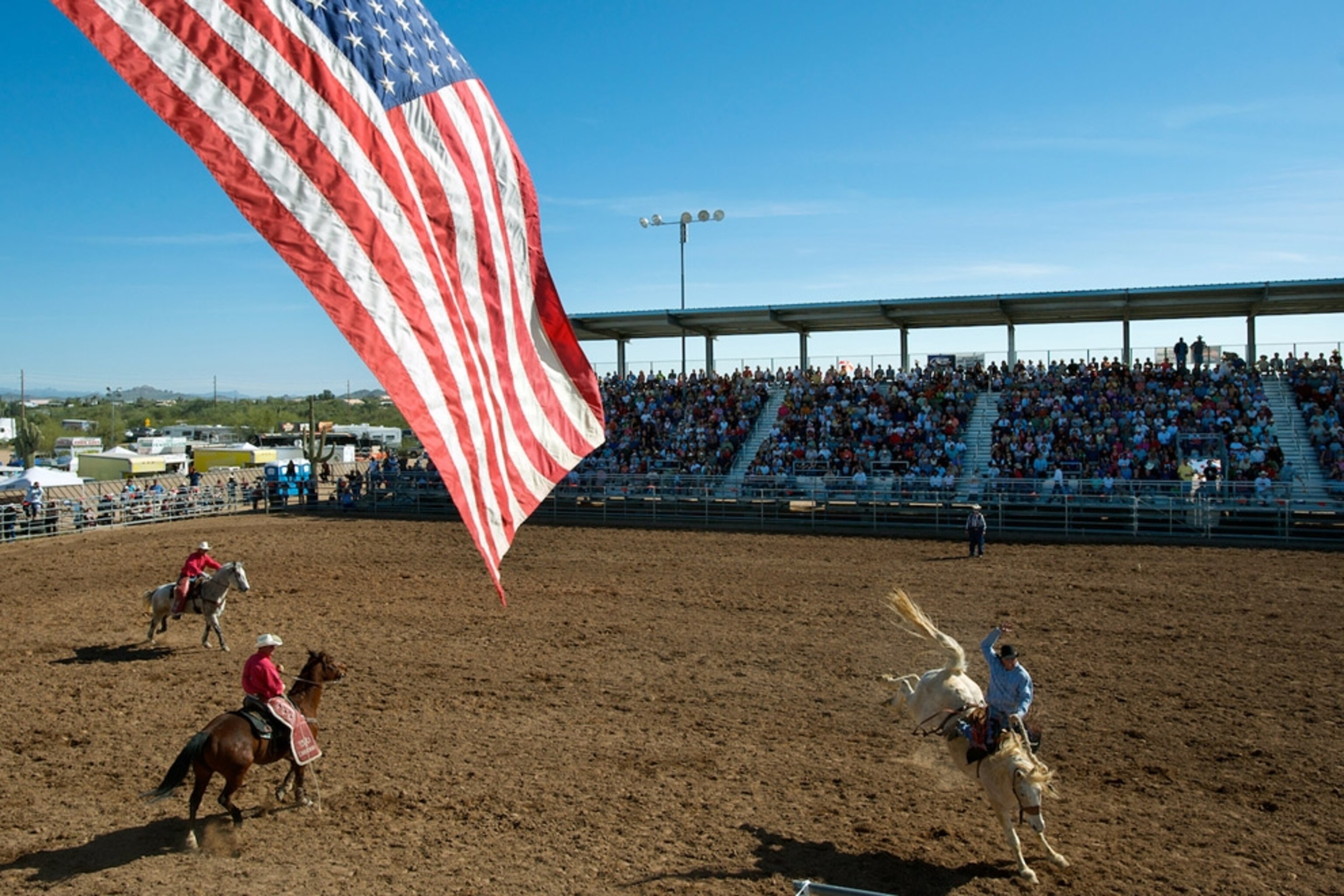 The American flag over a rodeo arena