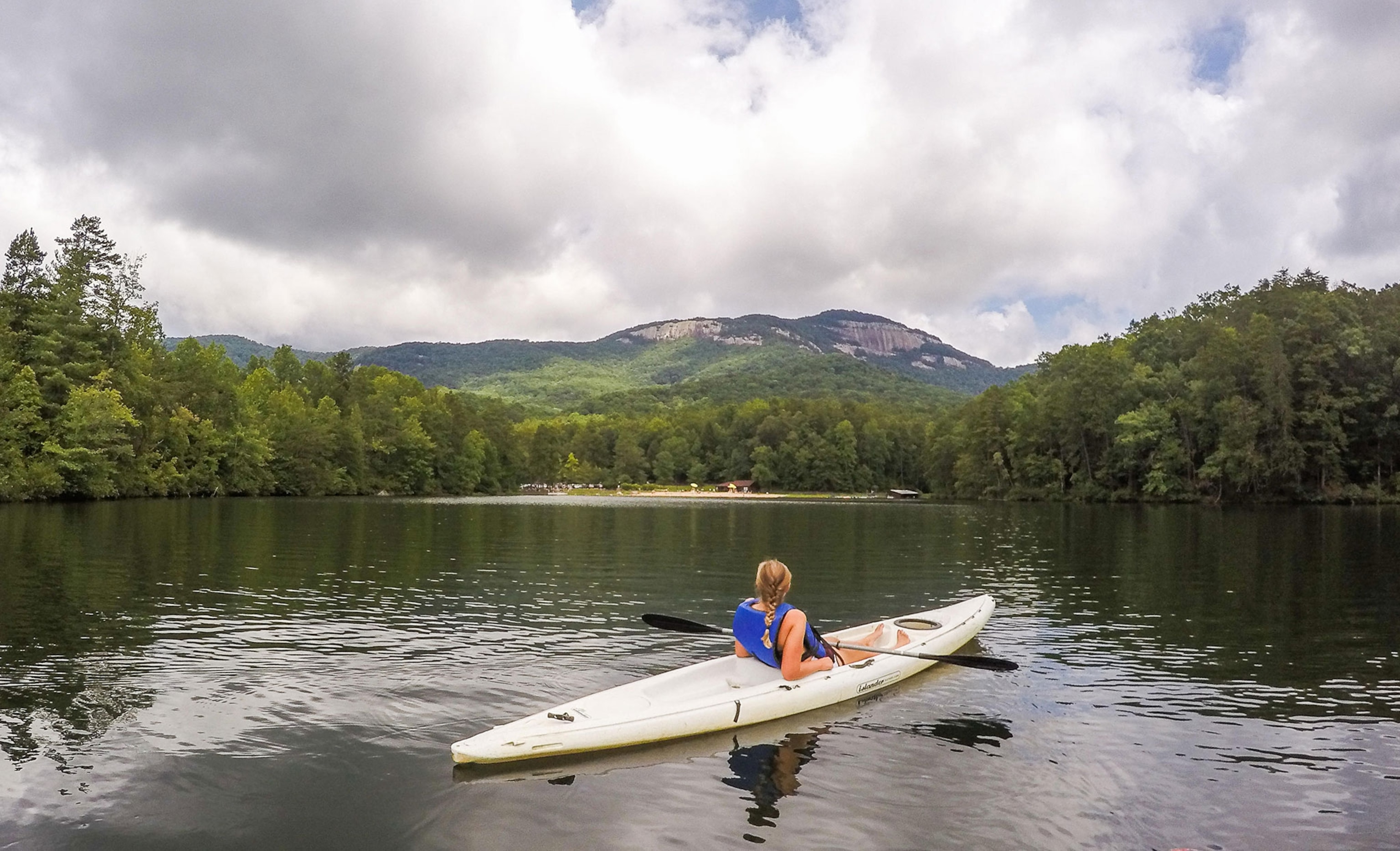 a kayaker on Pinnacle Lake at Table Rock State Park in South Carolina