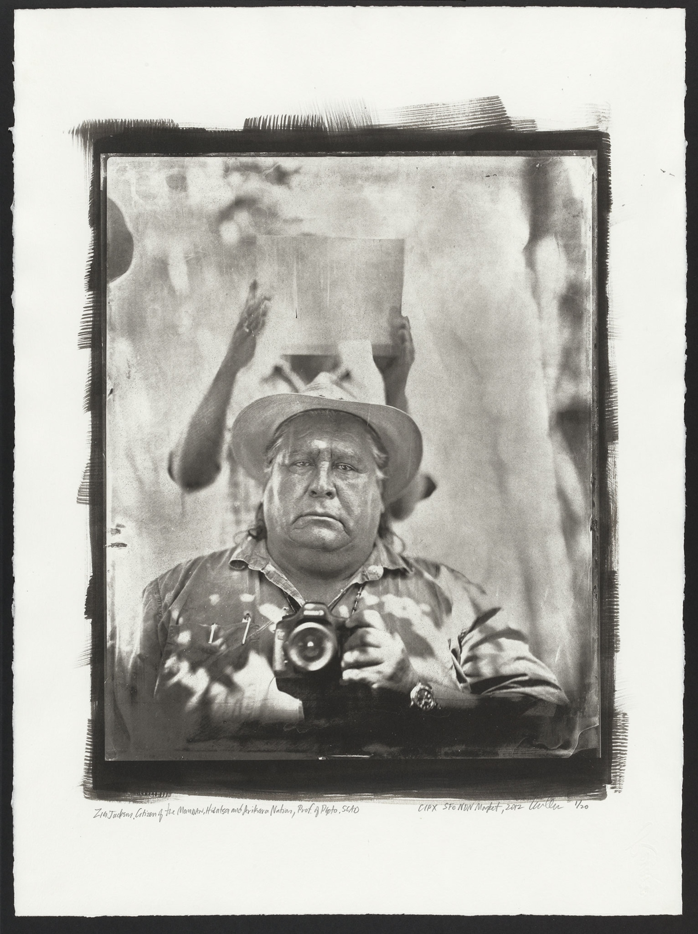 Zig Jackson, Citizen of the Mandan, Hidatsa, and Arikara Nation, Professor of Photography, Savannah College of Art and Design, holding a camera