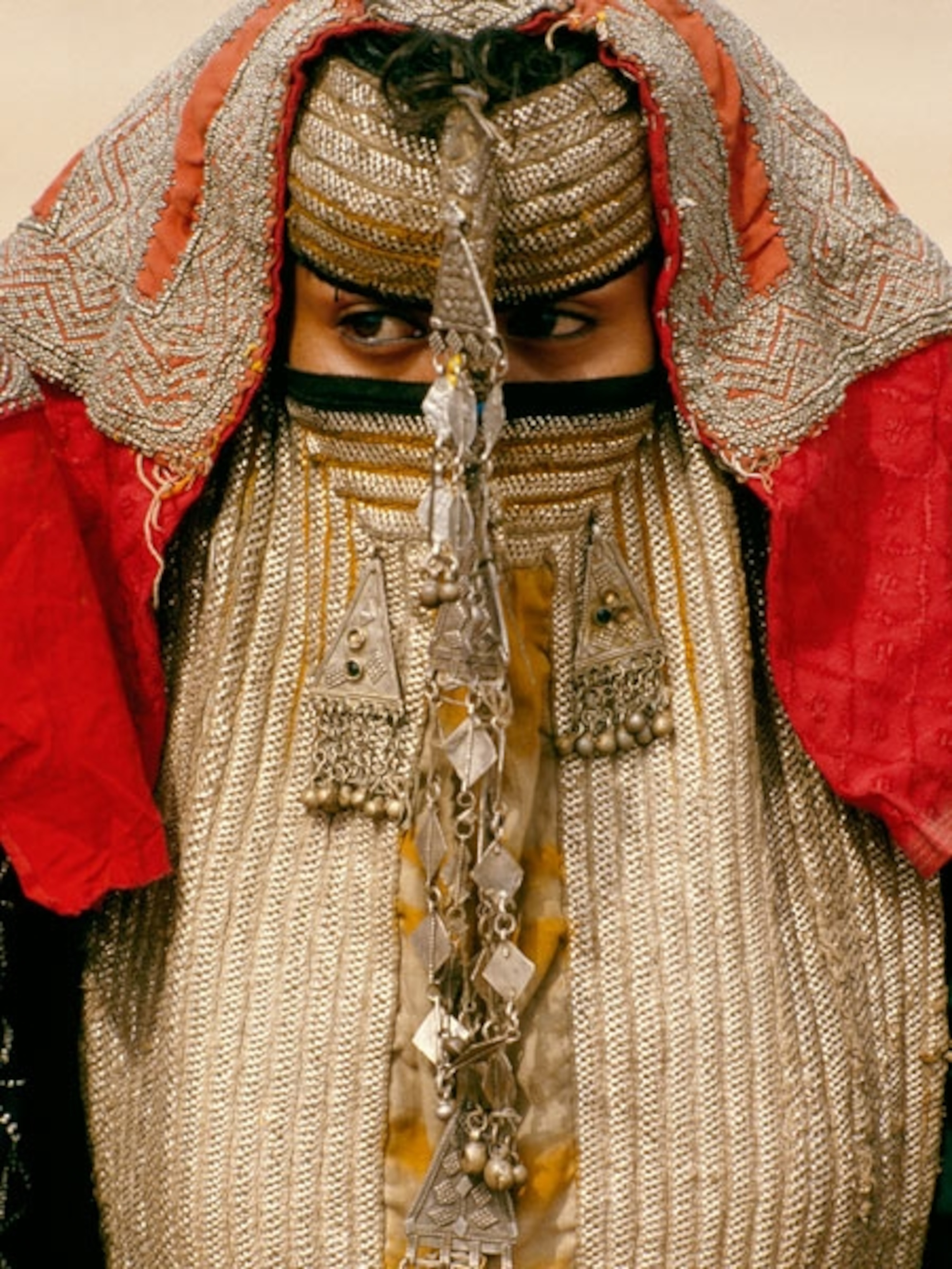 A woman in an elaborate veil