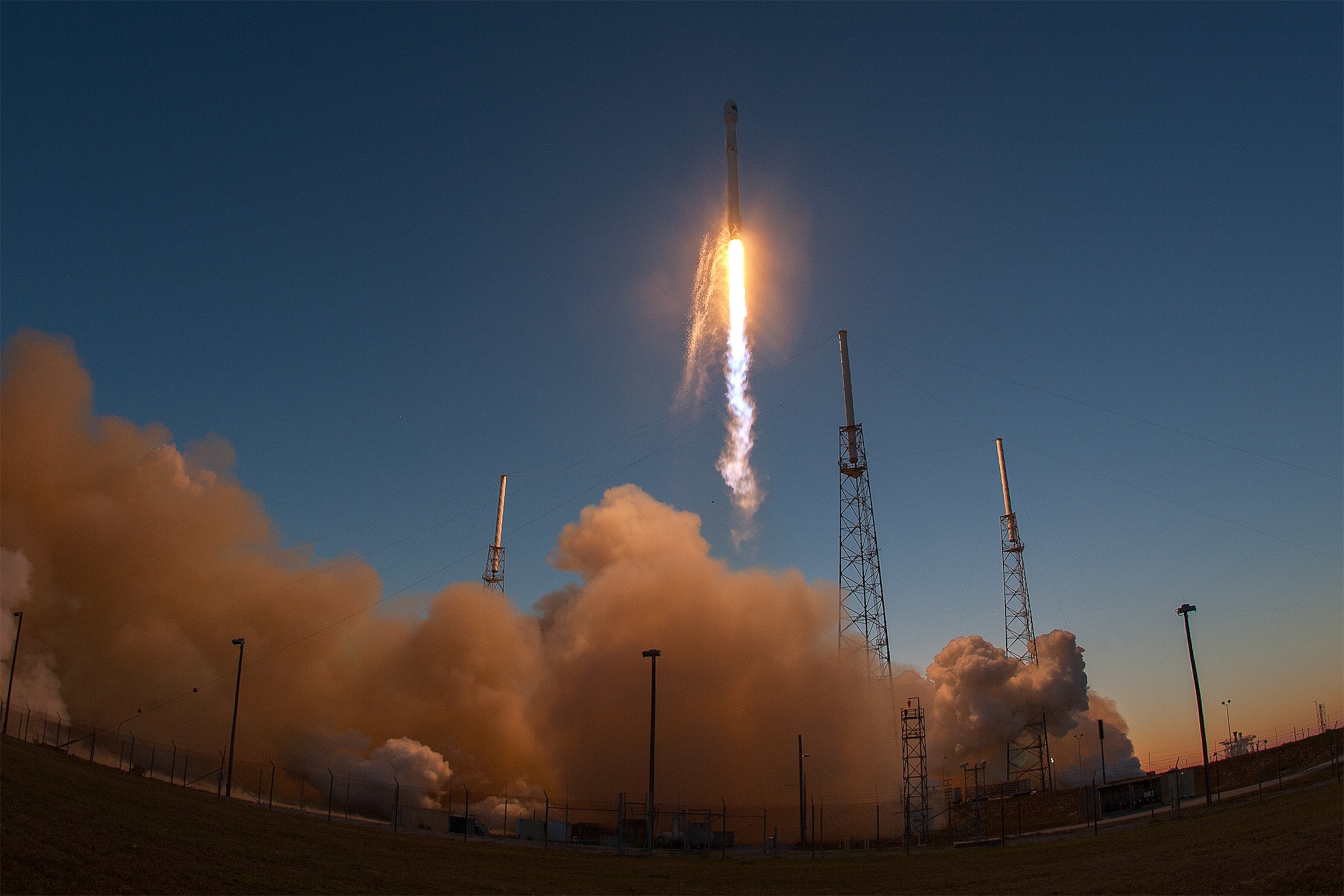 the Space X Falcon 9 rocket launching into space