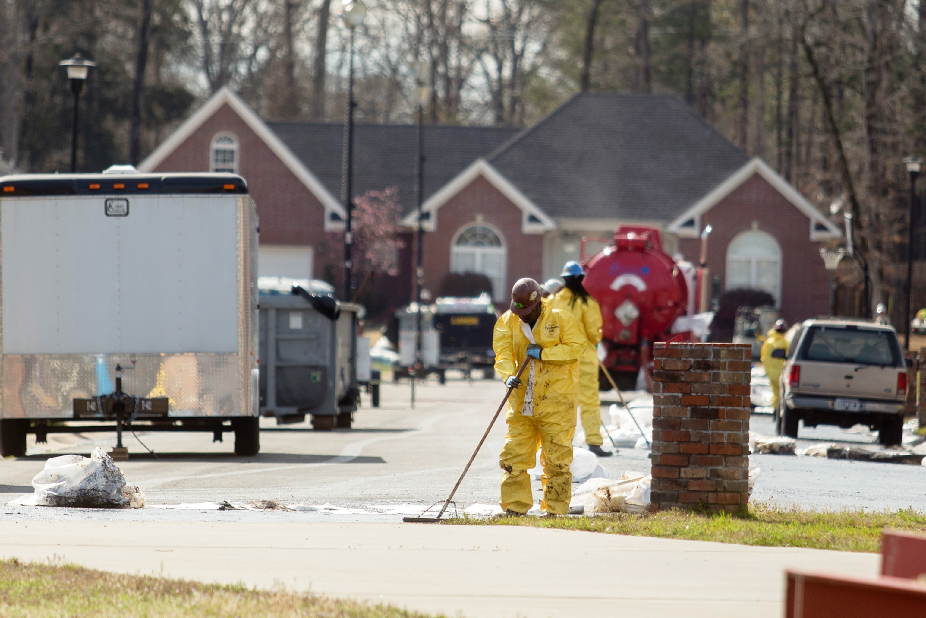 emergency crews cleaning up spilled oil in Mayflower, Arkansas