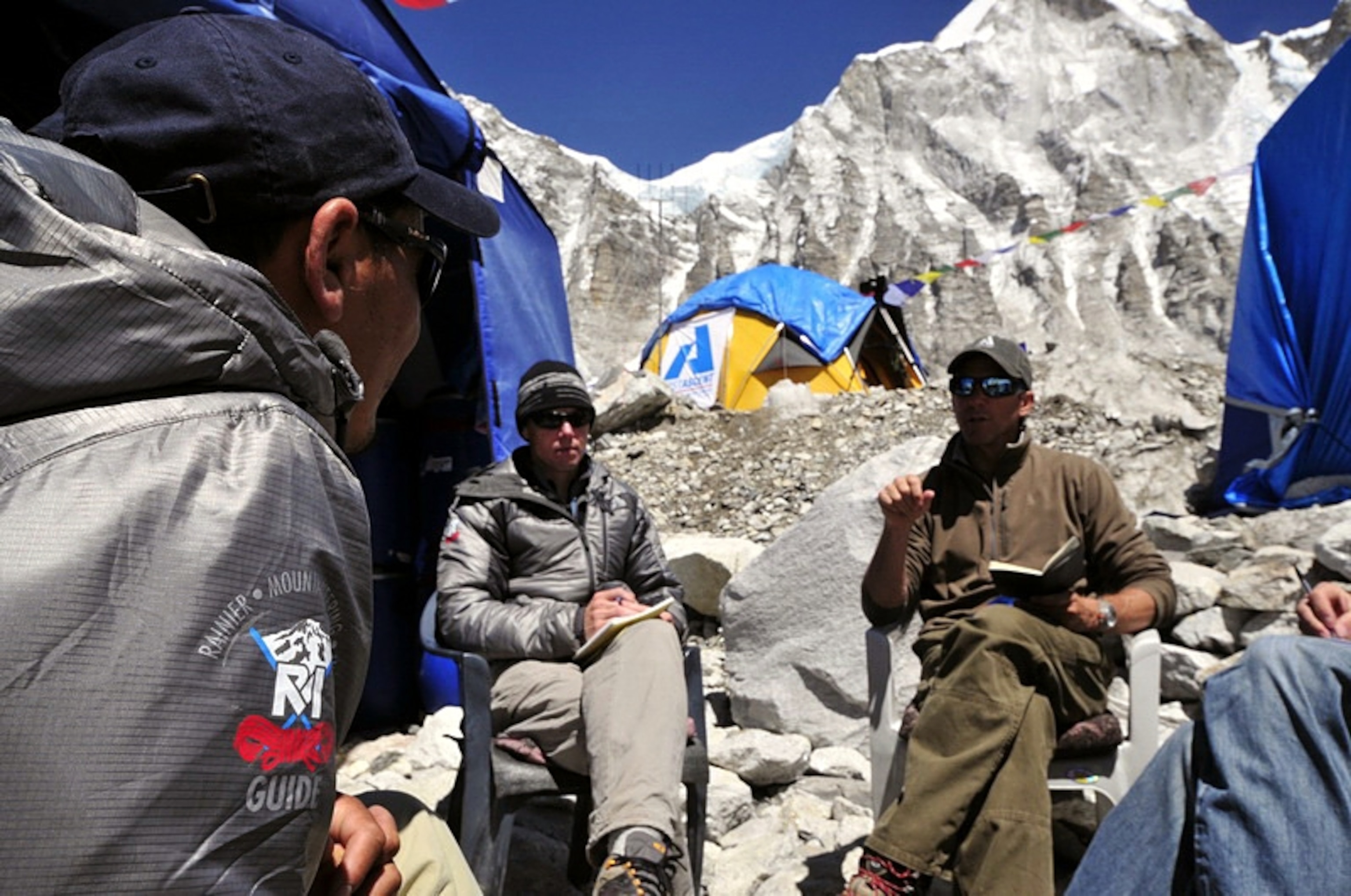 Peter Whittaker and Jeff Martin speak with Lam Babu Sherpa about the climbing schedule for Everest