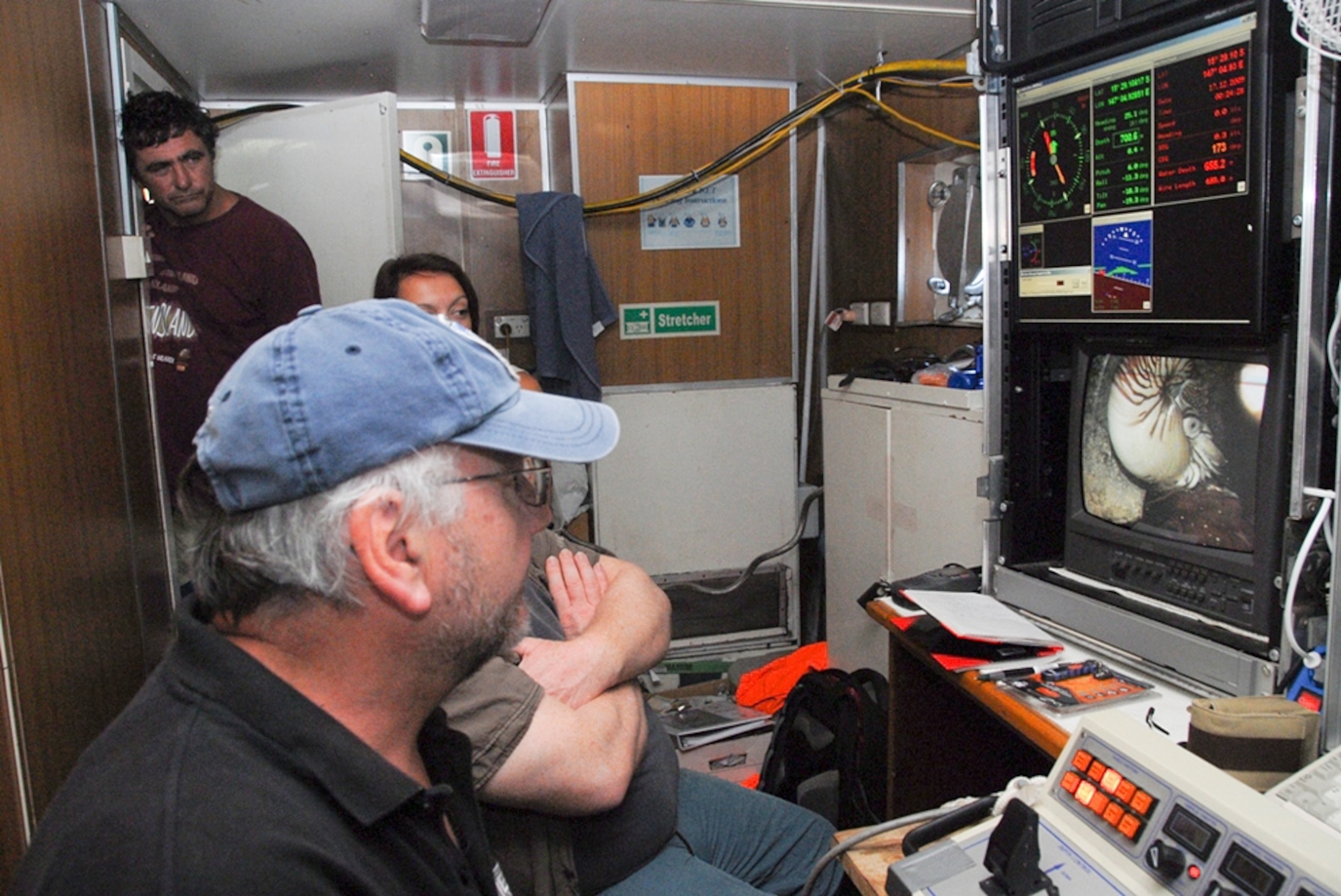 scientists observing nautiluses via remote cameras