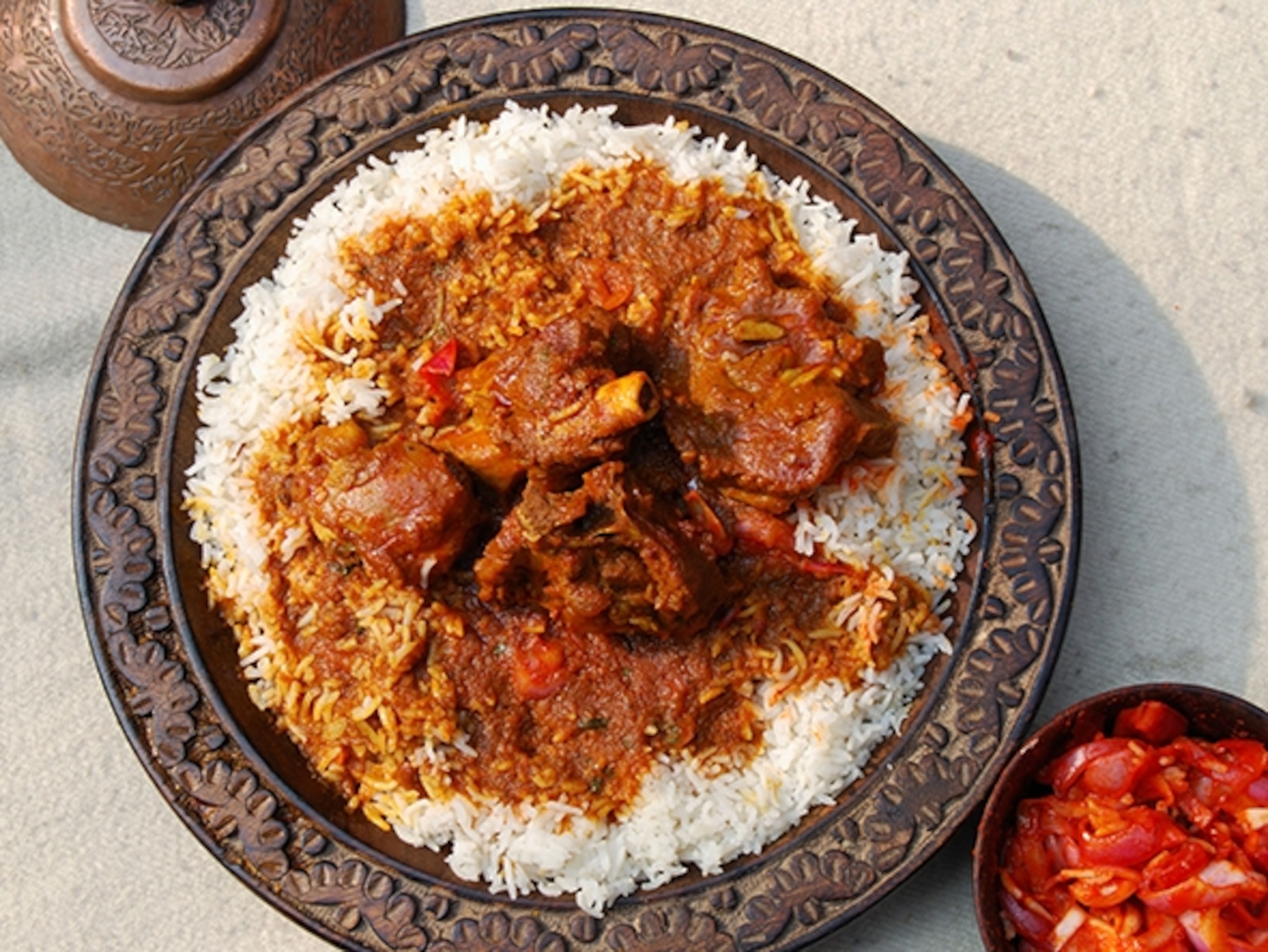 Rogan josh is an aromatic mutton curry made from lamb or goat, cooked in fresh Indian spices and red chilly curry. (Photograph by PIFood / Alamy)
