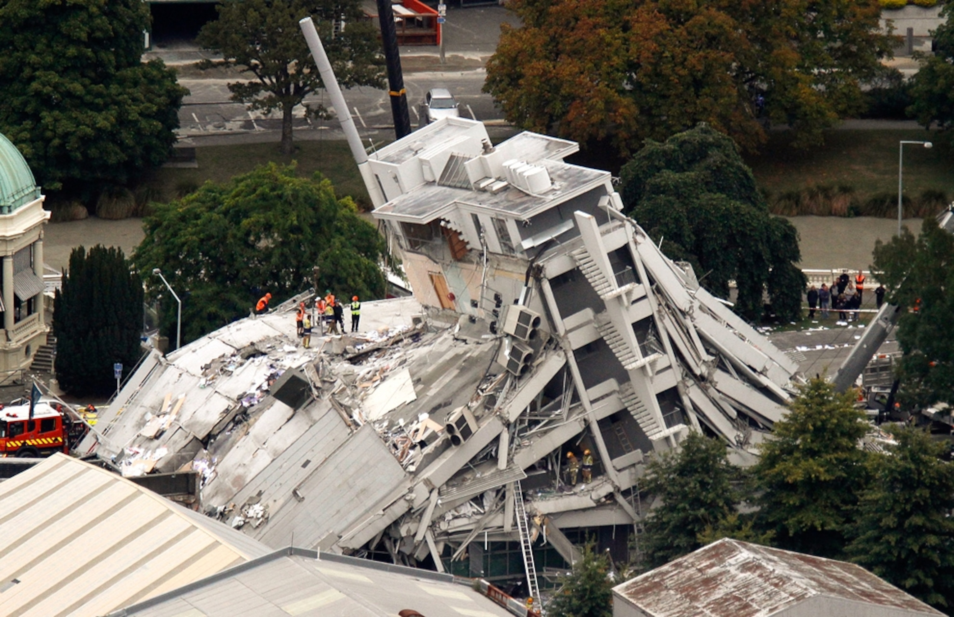 Earthquake in New Zealand (pictures): A collapsed building lies in shambles after the New Zealand earthquake