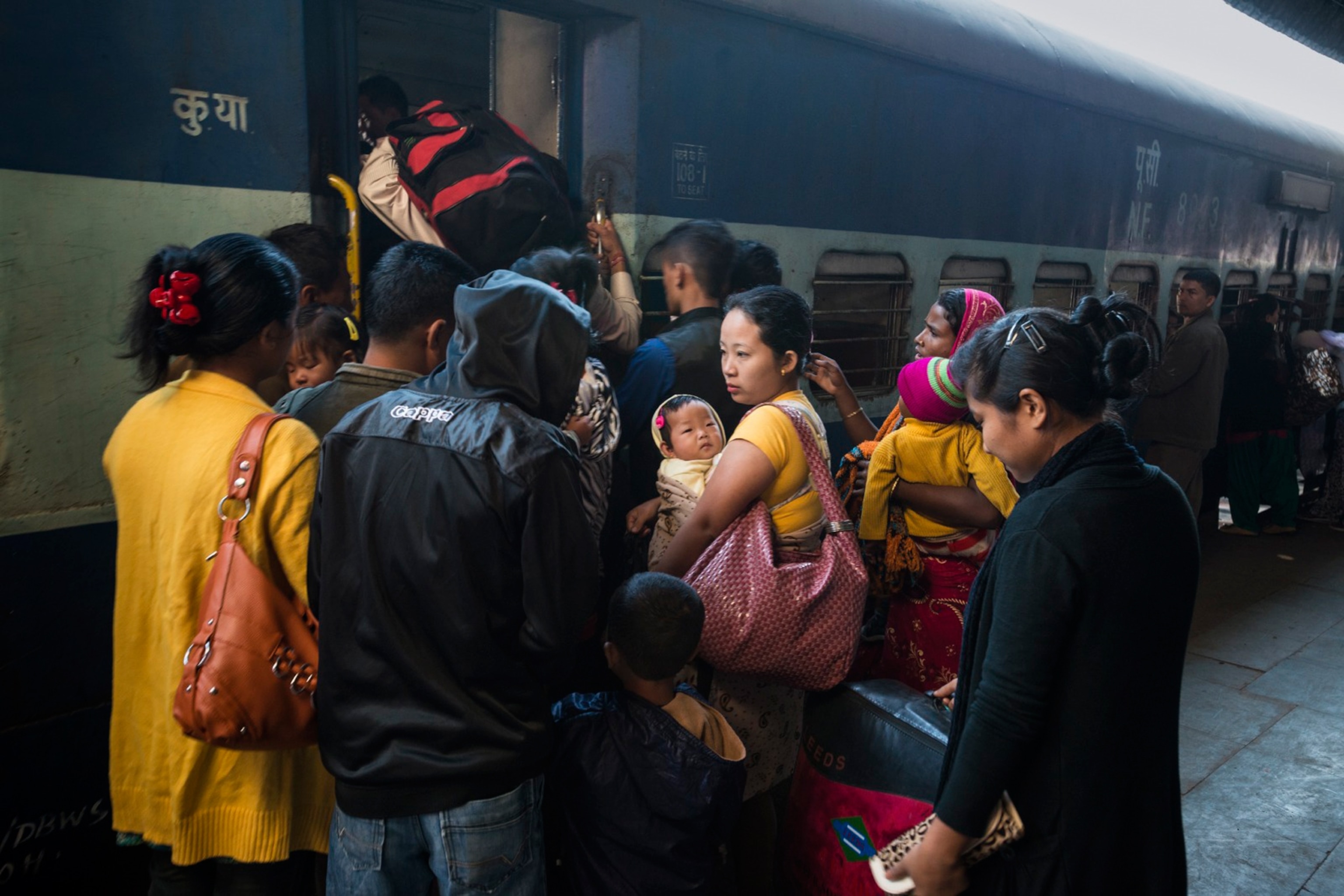 naga people boarding a train