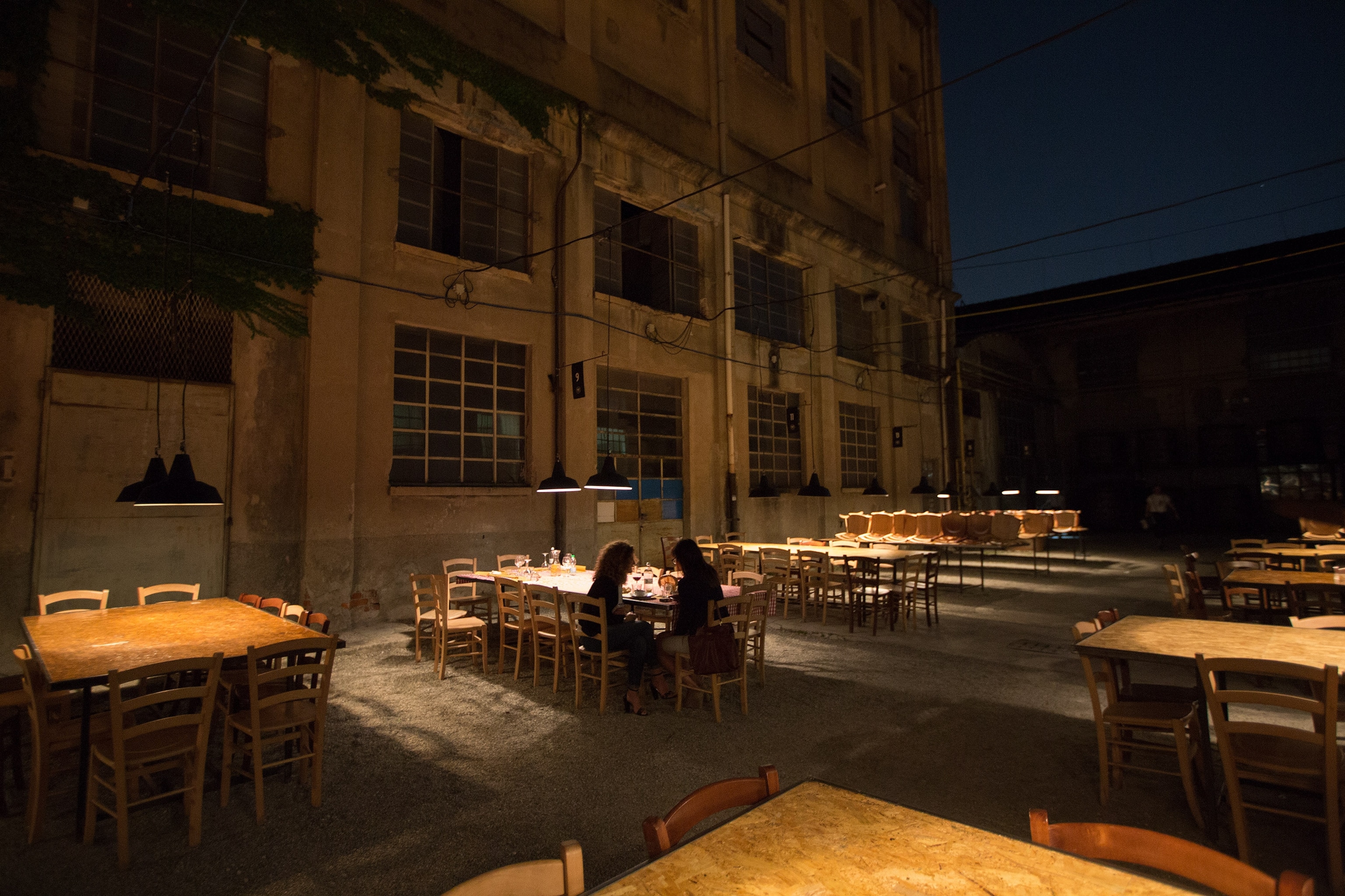 dining tables at the Spirit de Milan restaurant in Milan, Italy