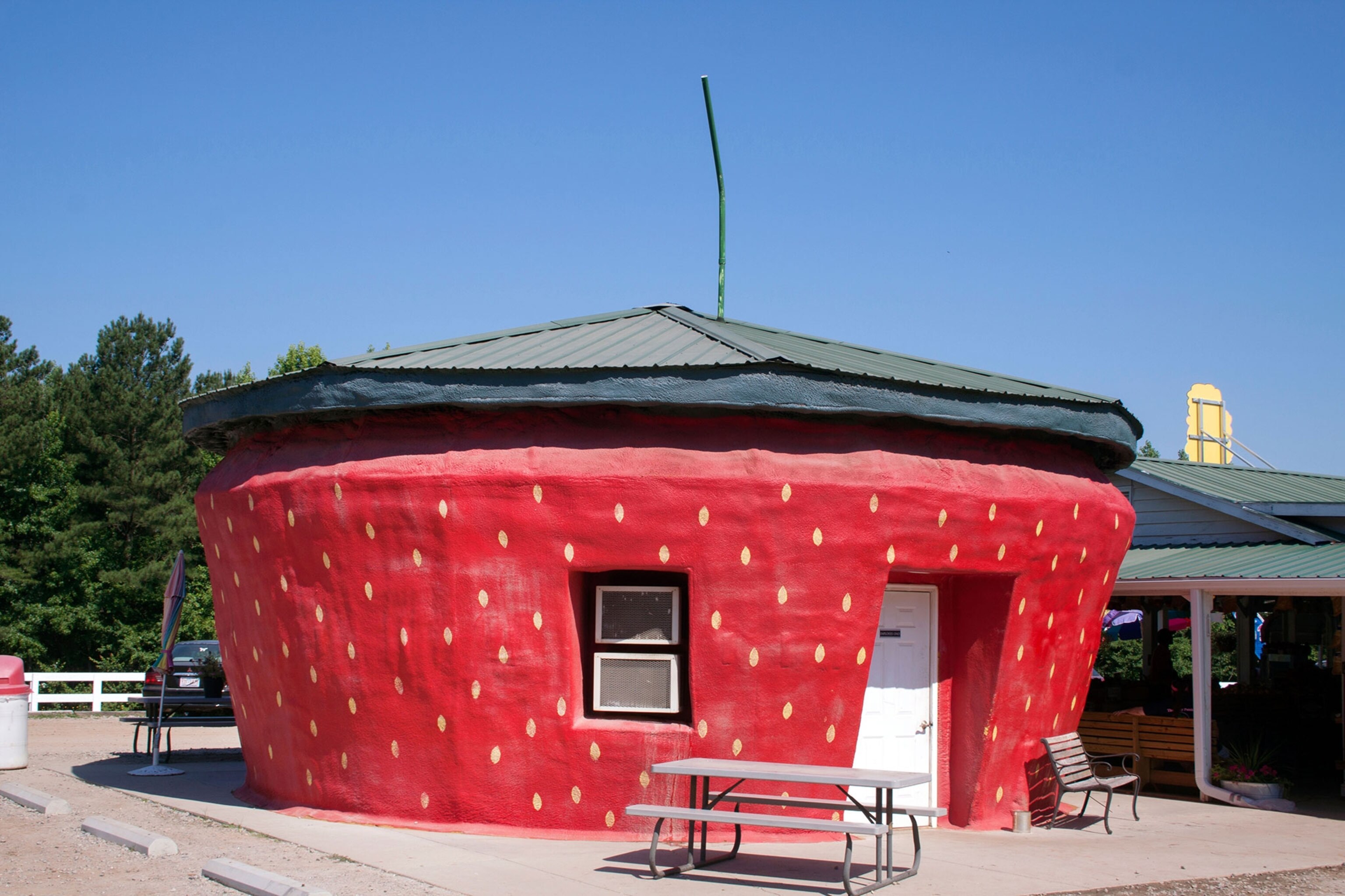 a giant strawberry stand